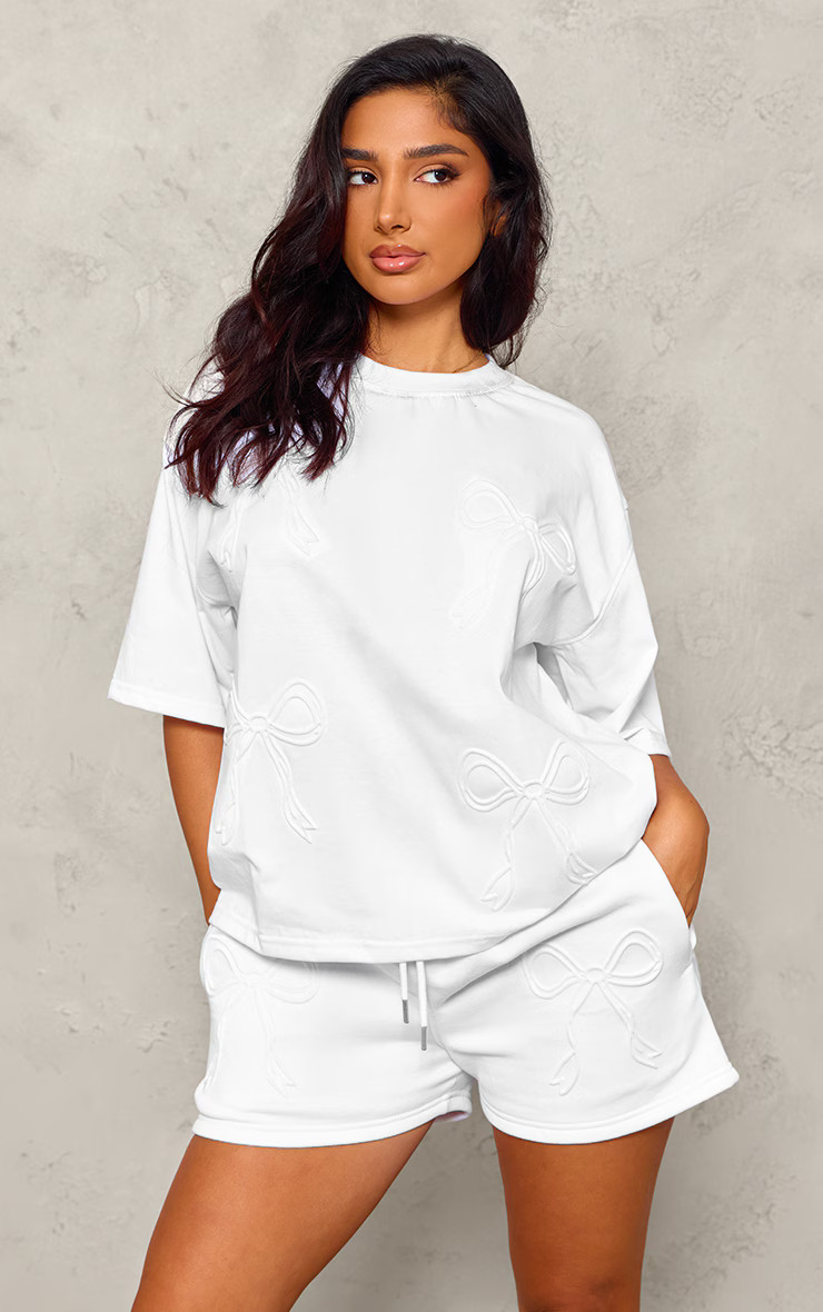 Petite White Embossed Bow Detail T-Shirt | PrettyLittleThing US