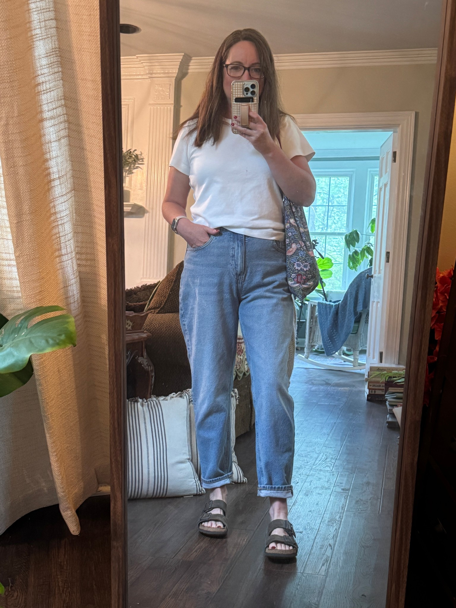 Light wash jeans and a white t-shirt. This is the BEST white t-shirt from Aritzia!  

#LTKOver40 #LTKFindsUnder50 #LTKSaleAlert