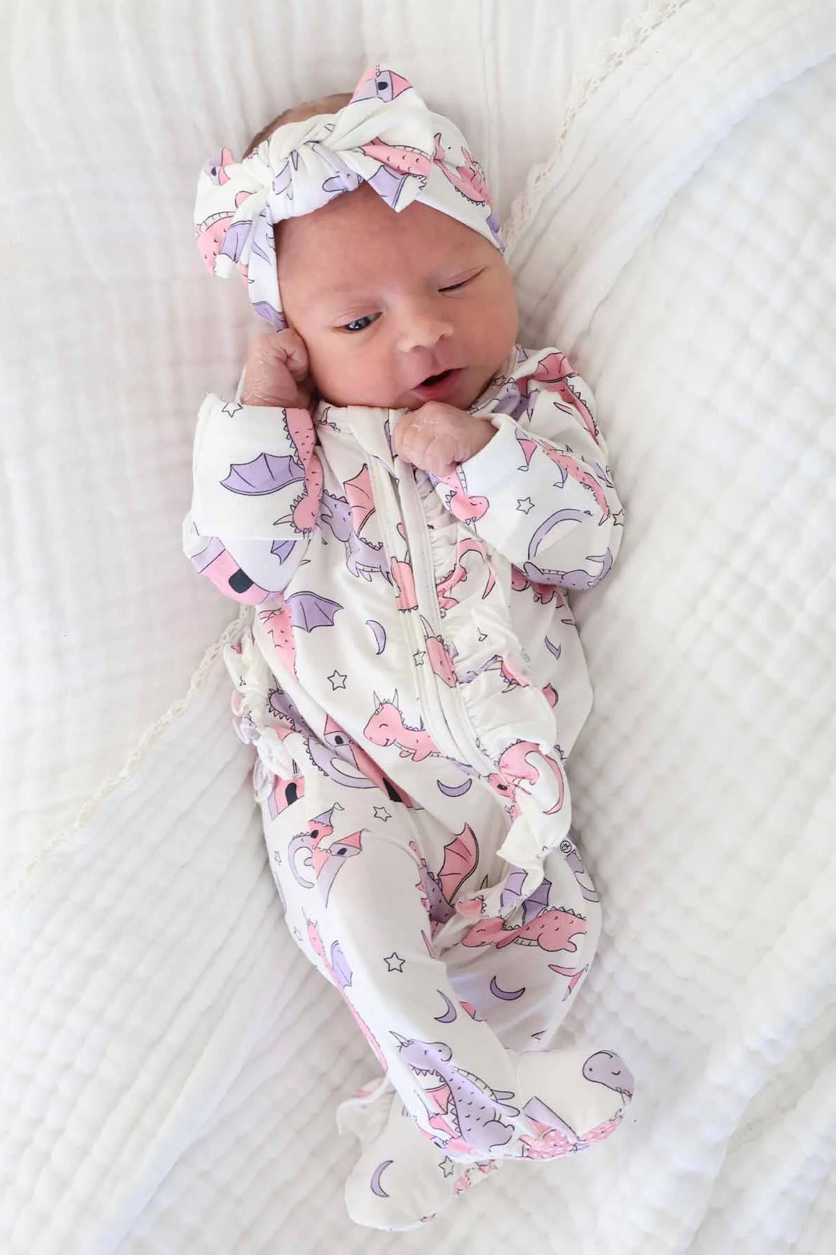 Dragon Adventure Ruffle Zipper Footie | Pink | Caden Lane