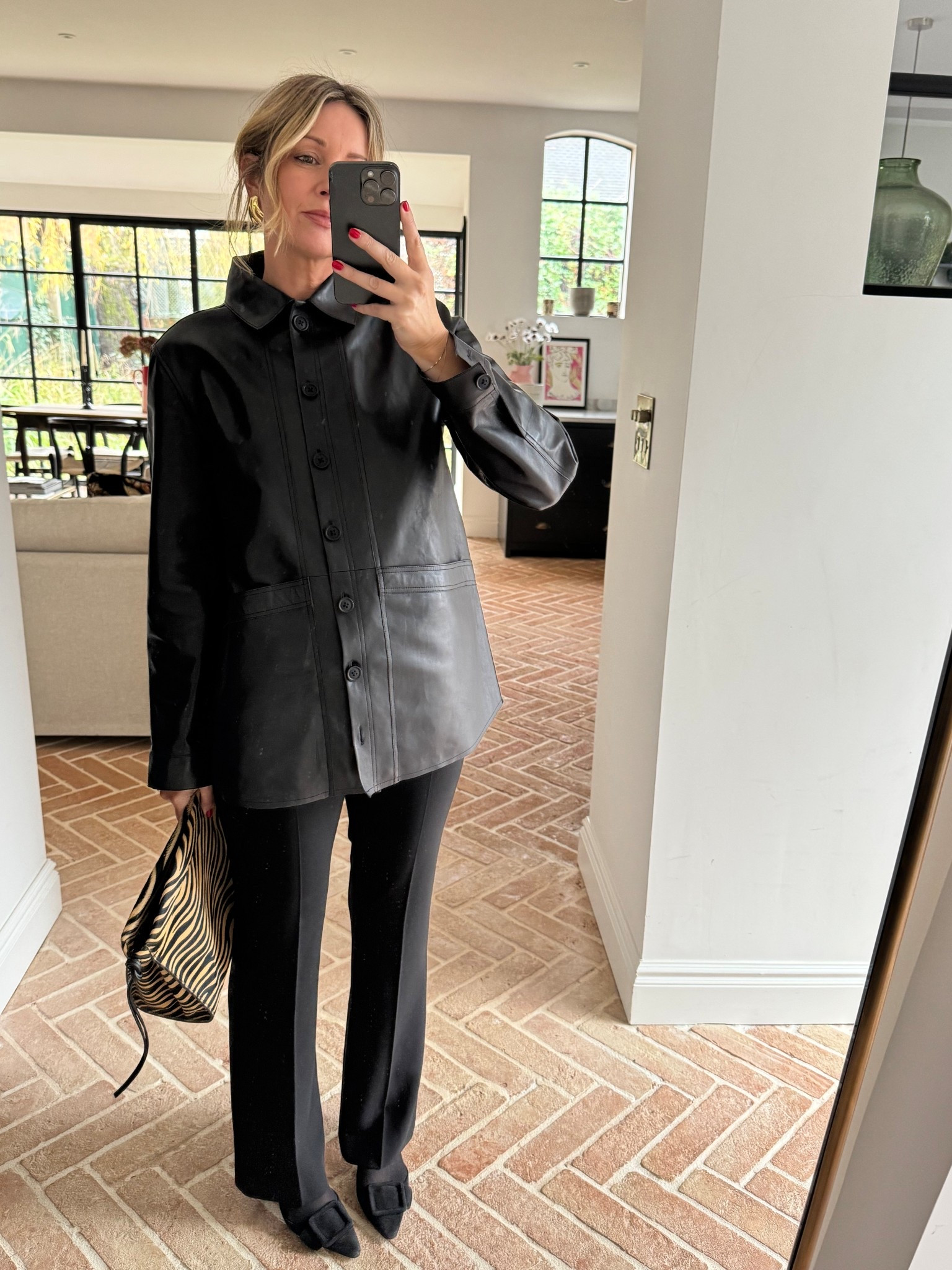 Sézane Leather shirt back in stock, I wear a M | Leather Shirt | Animal Print Bag | Manolos | Black Trouser 

#LTKdatenight #LTKpartywear #LTKworkwear