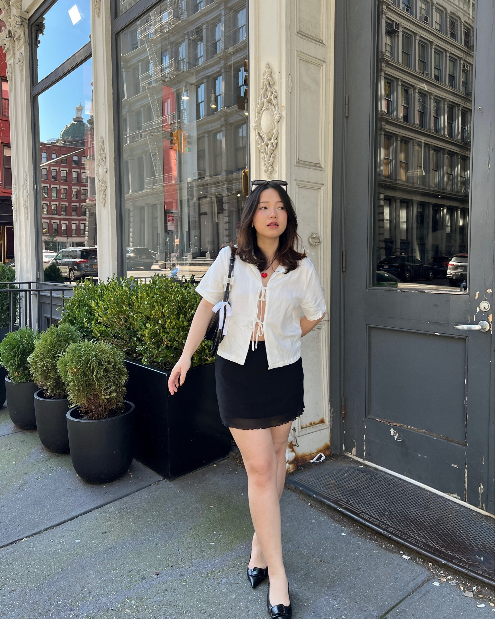 fall classy outfit inspo with white tie front shirt, black mini skirt and black slingback kitten heels

sizing details:
shirt - wearing size M
skirt - one size (the waistband is super stretchy and sits comfortably)

🔑 casual style fall outfit inspo pinterest inspired autumn fashion classy outfit idea 