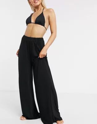 ASOS DESIGN jersey palazzo pants in black | ASOS (Global)