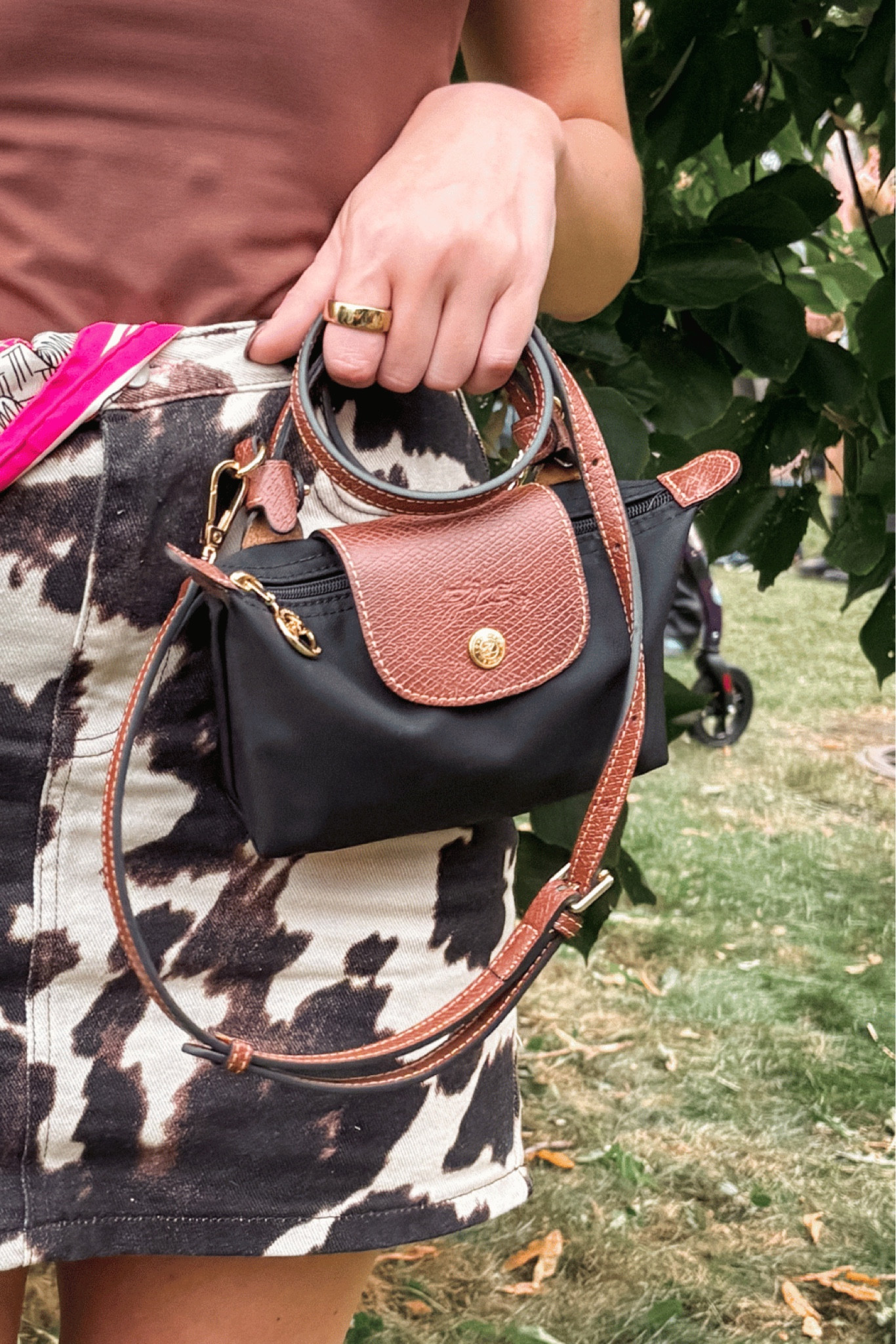 Technically, the Mini Le Pliage Longchamp I have is the “cosmetic case” option and is listed as such on sites, including the Longchamp website. There is a “small top handle tote” available as well for a little bit of a higher price (see the graphic for a comparison of the two). After some research, I went with the smaller option and have zero regrets. 

#LTKItBag #LTKStyleTip