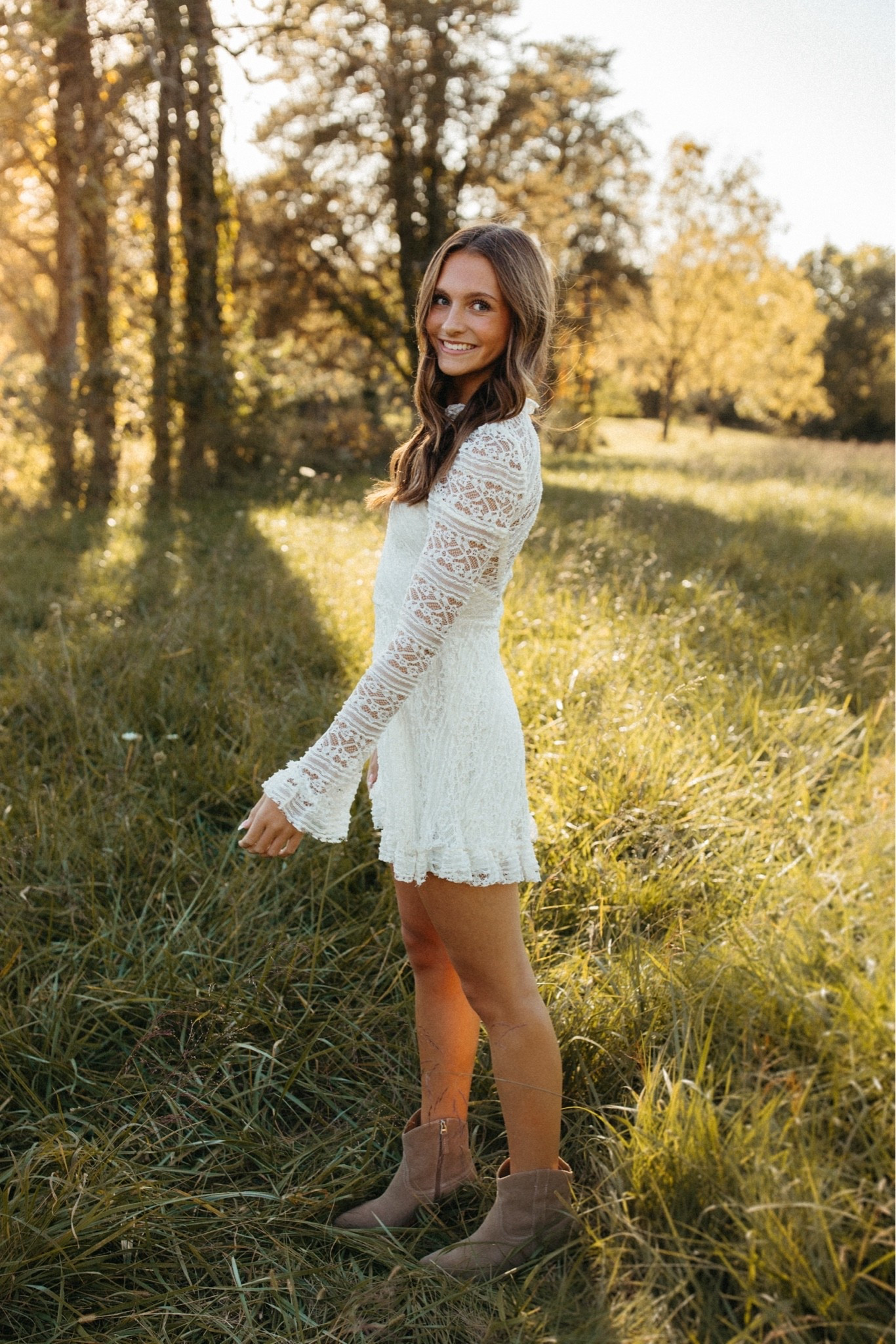 The cutest Free People dress.  She’s in the XS. She’s about 5’7. Comes in some great fall colors.