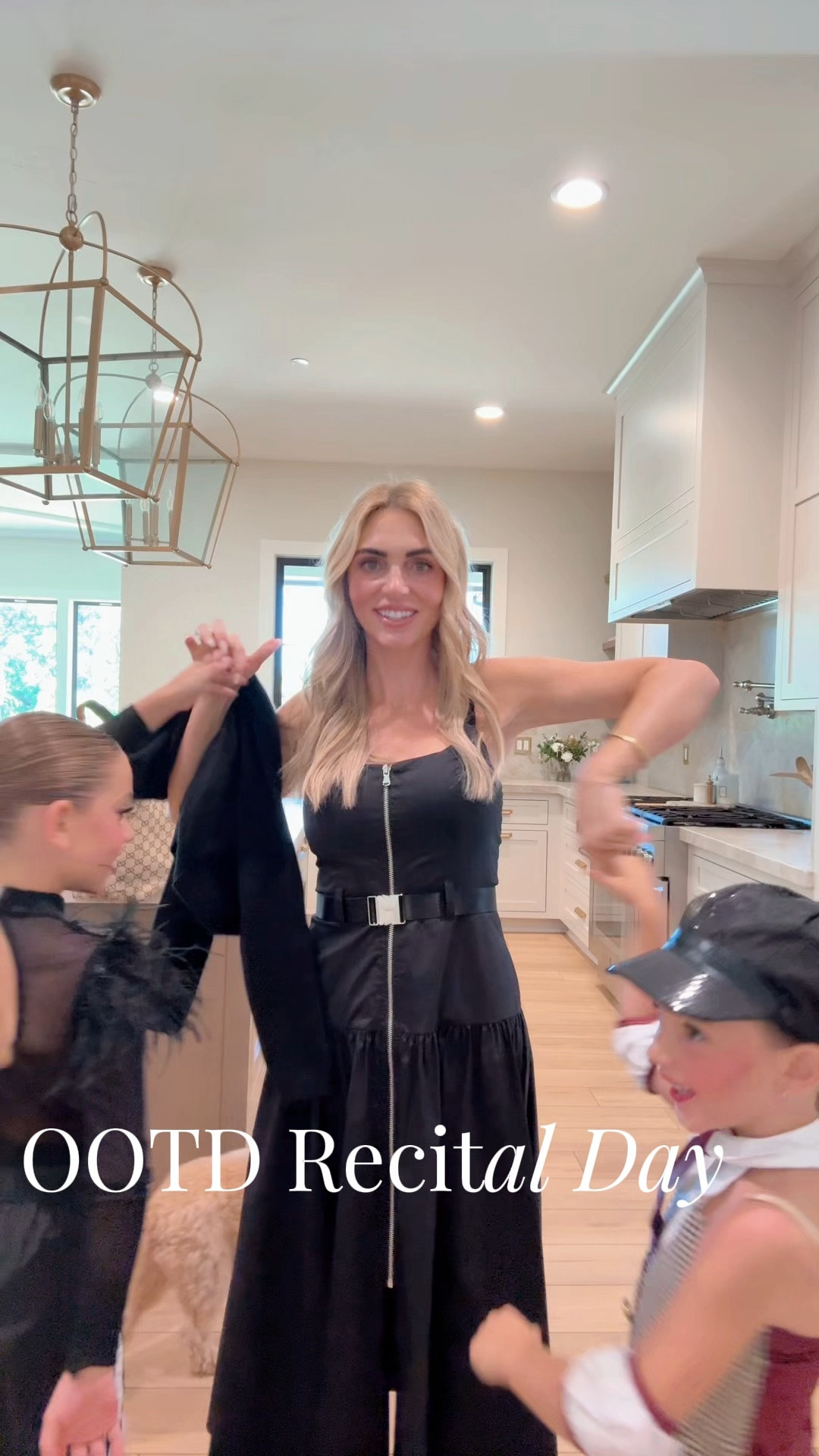 Recital day is here! ✨ The absolute chaos of getting everyone out the door, but first a fit check 🖤

#DanceMom #dancerecital #MomStyle #OOTD #GirlMom