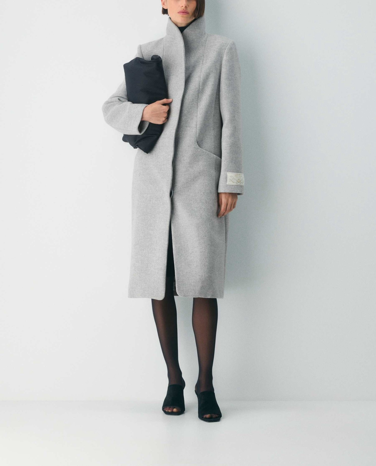 Meticulously crafted to deliver warmth to -20°C / 4°F, this is a streamlined cocoon coat with a funnel neck, hand pockets and an ultra-thin UnReal Suede Interlining for added warmth and wind protection. It’s expertly tailored with Luxe Wool Cashmere — luxurious virgin wool and cashmere that’s naturally warm with a refined feel. It’s sourced from a premier Italian mill. Under $400.

Keywords: Wool coat, cashmere coat, cashmere jacket, winter coat, winter coats, ski outfits, ski coats, date night outfits, work outfit, work outfits, business casual outfits, modern business casual coats

#LTKTravel #LTKWorkwear #LTKgrwm