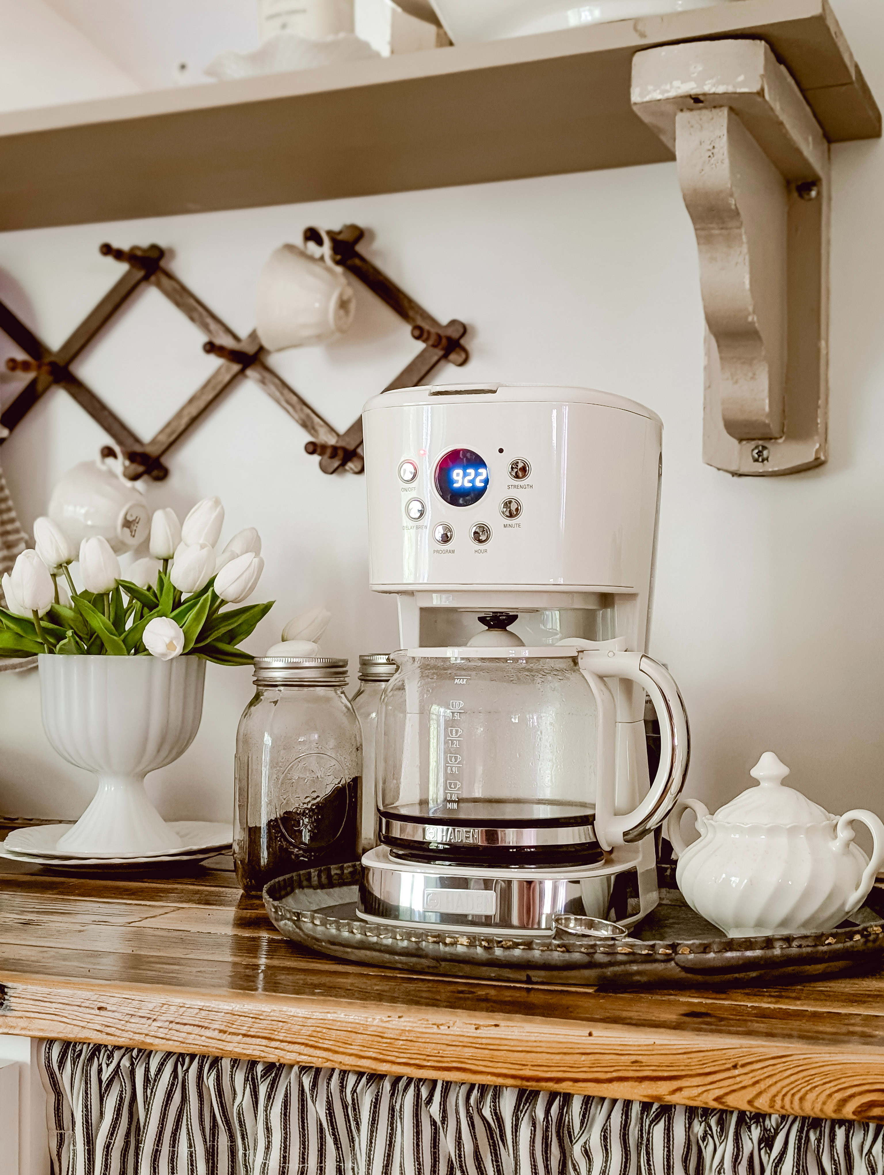 We replaced our old Keurig with this new Haden drip coffee pot. It's white (which I love!) and it has a retro / vintage look to it compared to some of the more modern coffee makers out there. And since we love our Haden toaster, we figured why not try their coffee maker. Jake says it's a 10 out of 10! Admittedly, I'm not a coffee drinker - so my main requirement was that our new coffee maker be pretty! I had been eyeing the Smeg, but I couldn't justify the price. I don't know if I'd call this a dupe for the Smeg coffee pot, more of a Smeg alternative... but we love it either way! 

 #LTKHome