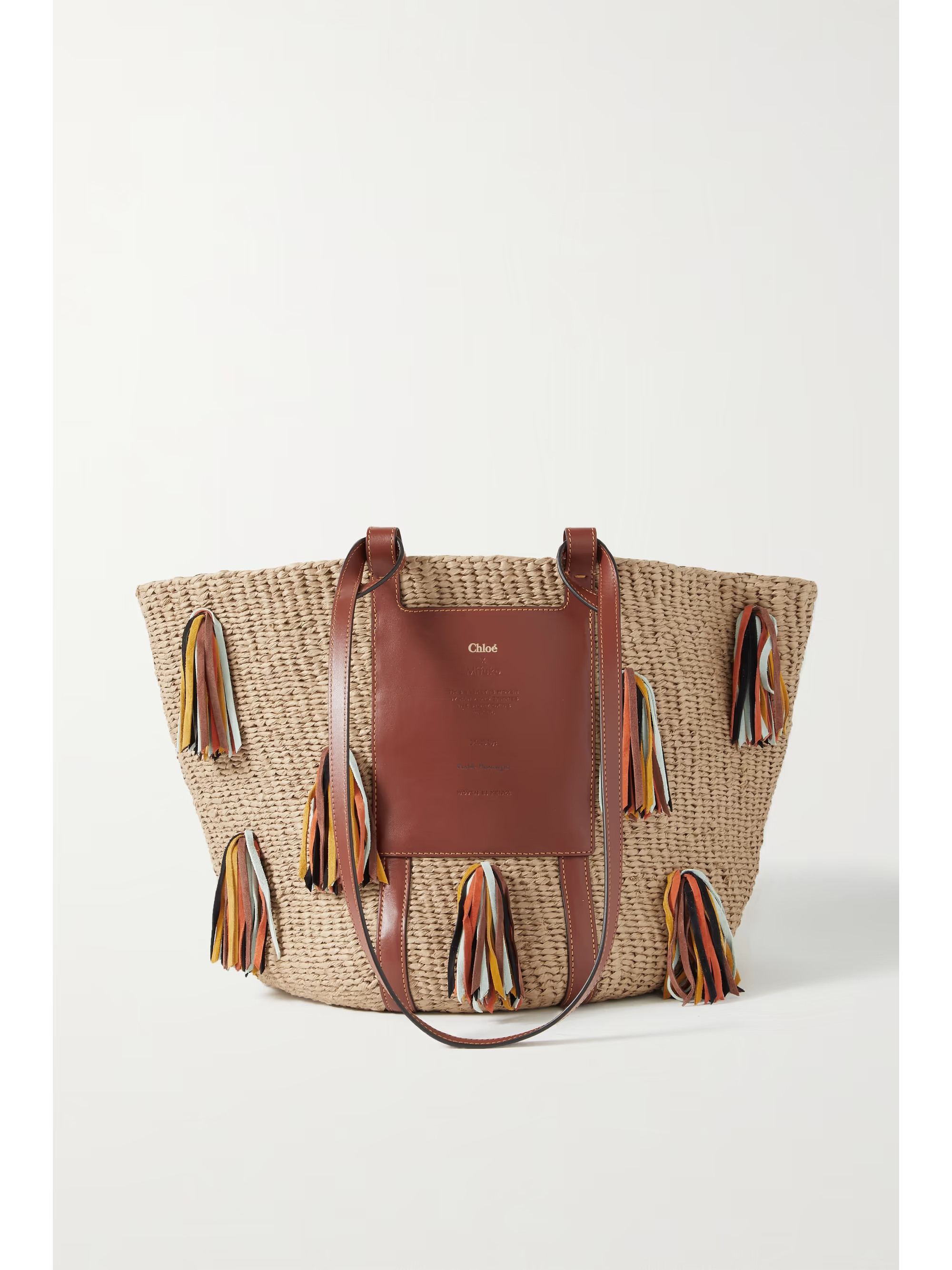 Large leather-trimmed tasseled raffia basket bag | NET-A-PORTER (UK & EU)