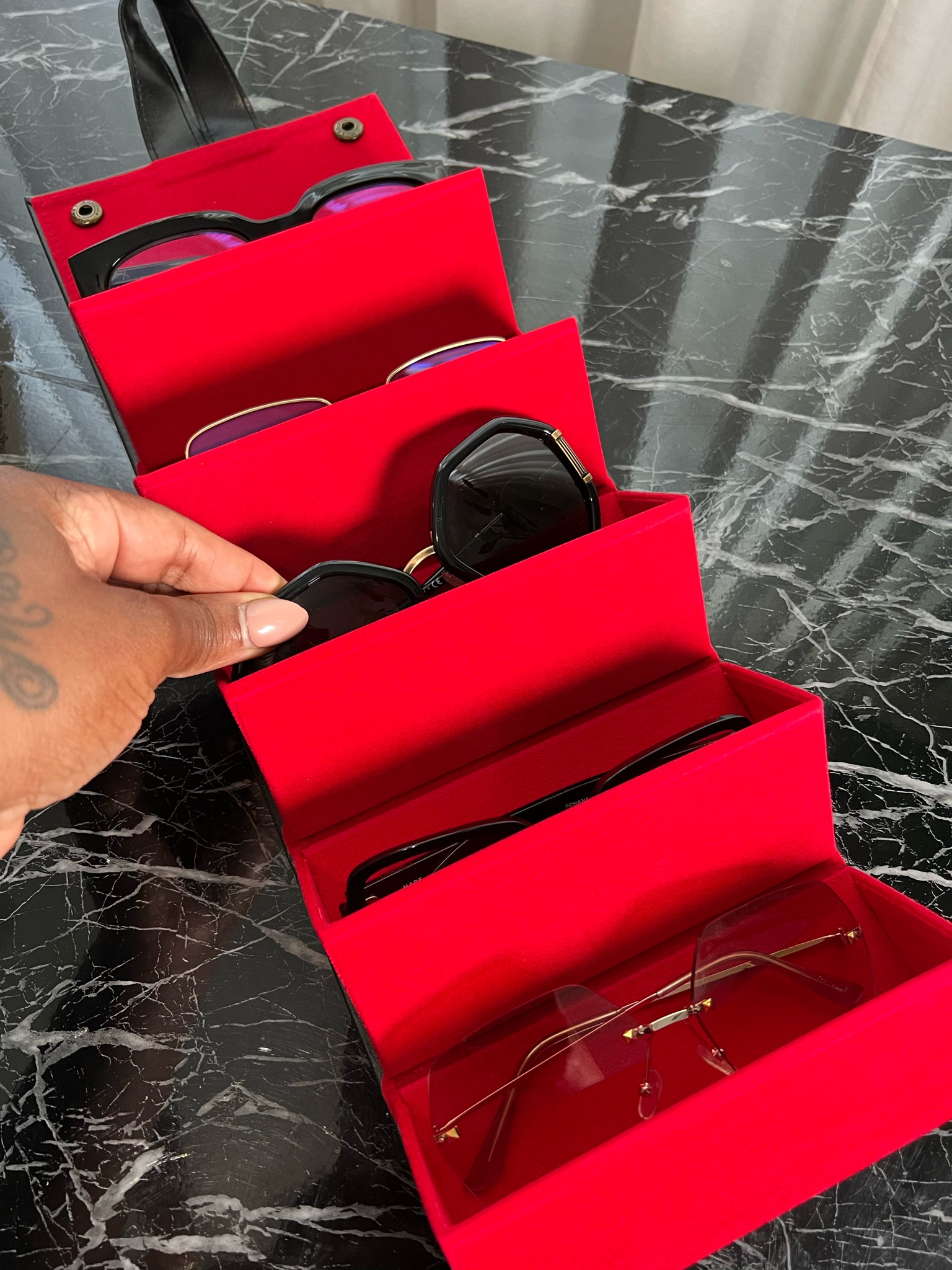 Sunglasses organizer great for travel 

#LTKunder50 #LTKstyletip #LTKFind