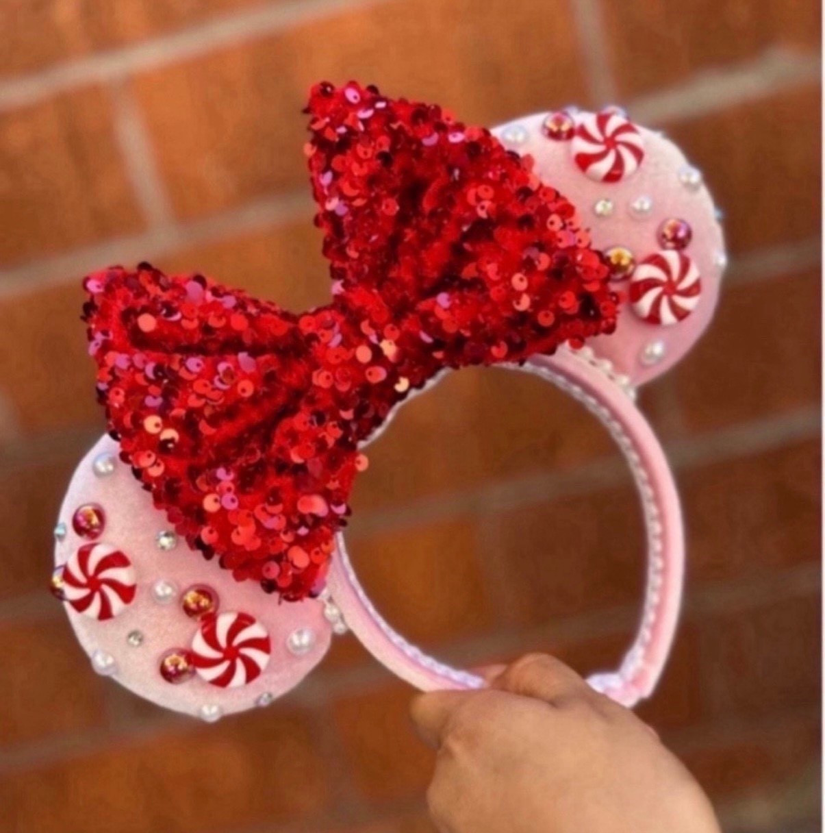 Peppermint perfection for the holidays! ❤️🤍 These sparkly Christmas ears are the must-have accessory for festive park days, holiday parties, or adding a little extra magic to your outfit. ✨🎄 Linked on LTK so you can grab them before they’re gone!

Save this for your Disney Christmas inspo! ❄️🎀

#DisneyChristmas #DisneyEars #HolidayMagic #DisneyStyle #FestiveFashion #DisneyAccessories #ChristmasStyle #DisneyFinds #MerryAndBright #DisneyCreator #LTKSeasona 

#LTKmomlife #LTKHoliday #LTKGiftGuide