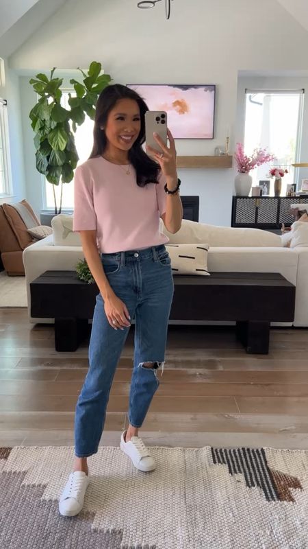 Spring outfit with pink knit top paired with mom jeans and sneakers for a chic look. Wearing size 25 short in the jeans and size XS in the top. Use code HKCUNG20 for 20% off your first purchase on the top! 

#LTKstyletip #LTKSeasonal #LTKsalealert