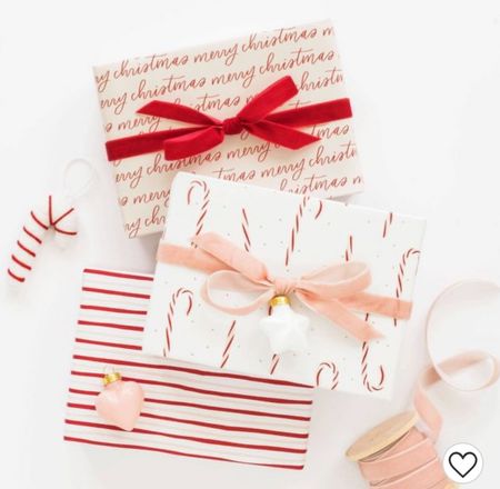 Christmas gift wrap at target! Affordable nice quality wrapping paper pink Christmas candy cane print pink and red theme 

#LTKSeasonal #LTKunder50 #LTKHoliday