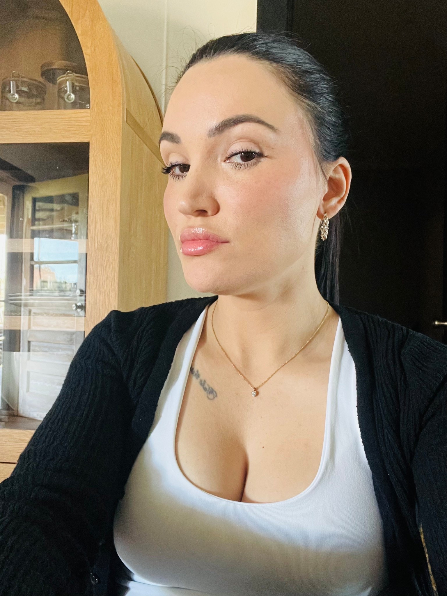 My go-to simple Look 🤍
Clean white tank, cozy black layer, simple jewlery — effortless, grounded, and easy to repeat. When you feel good in the basics, everything flows.
Hair tied back on a windy day with glossy lips 👄 is a must . 🤍

Linking my everyday staples ✨

#LTKootd #LTKdayinmylife #LTKBeauty