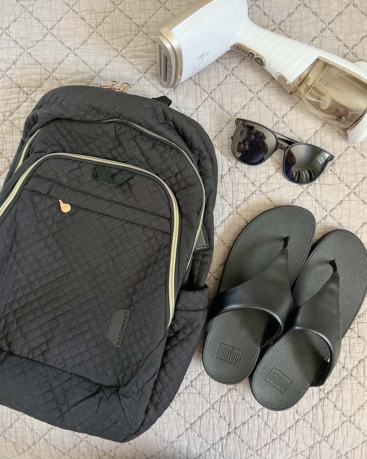 DID I TAKE MY LARGER STEAMER FOR TRAVELS!? Yes, yes I did and have no regrets!! I used it every day while in Mexico. Between my linen (ish) shirts and Ava’s little dresses - we we’re definitely in need. A more compact steamer would be nice in the future - but since I already had one I didn’t necessarily want to spend $ on another. I’ll also link some smaller ones that I’ve seen others raving about! 

My sunglasses -  I got them last year and I love them so much that I might get another color for this summer to have on hand! I’ve always been a lover of over-sized sunnies! 

THE BACKPACK! This was an unexpected find! And now that I’ve found this brand I want all their travel bags and luggage in all the sizes. 

This bag had so many pockets and pouches and made for the perfect carry-on, especially with a toddler and their snacks and entertainment. 

The FitFlops I did some research on as far as comfortable flip flops go for needing arch support and this is where I landed! (Reviews said size up and I’m glad I did) 

#LTKunder50 #LTKeurope #LTKtravel