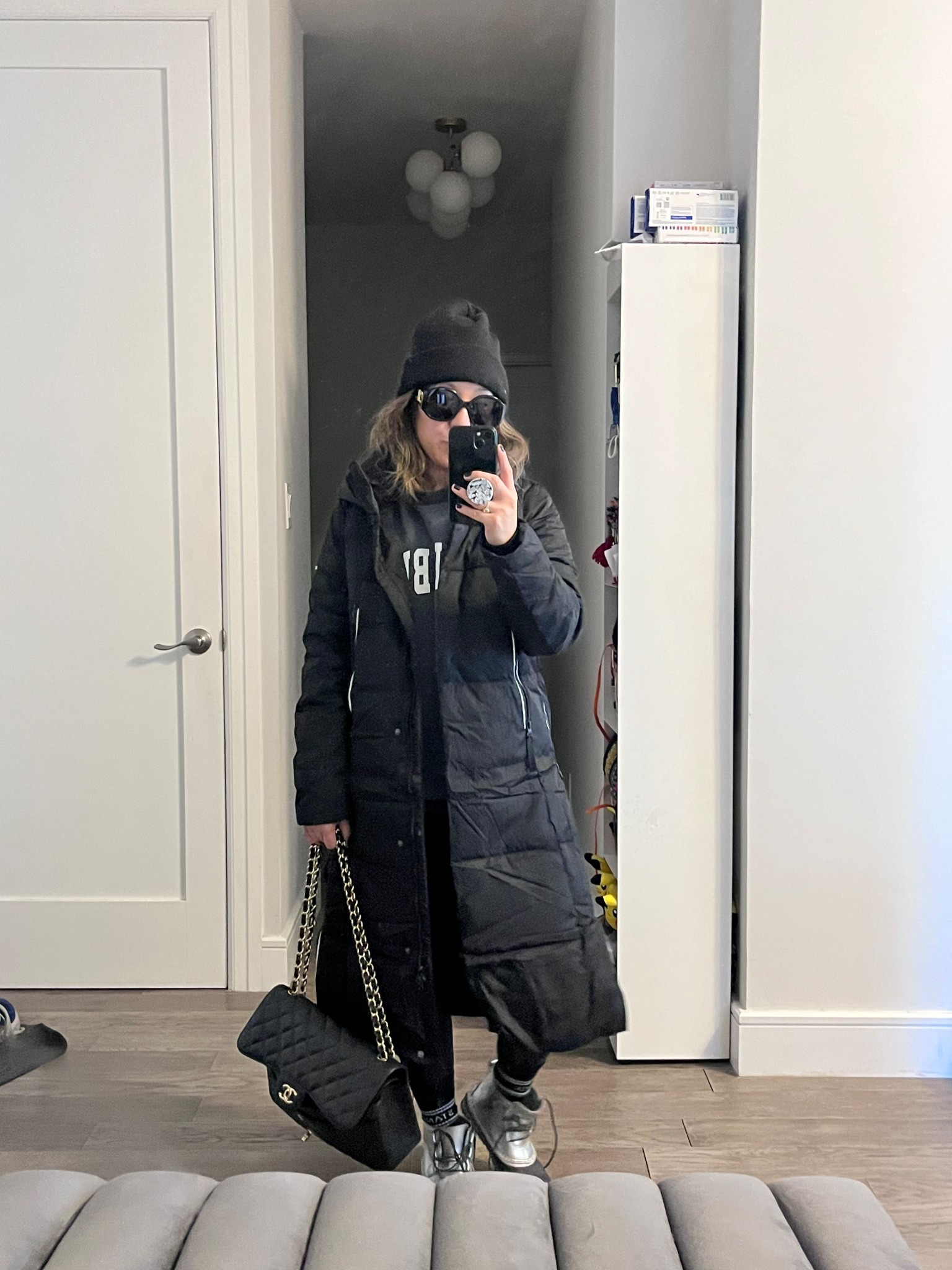Black on black on black. Tried and true colorway. This is the longer version of the warmest coat ever. I’m wearing an xs. I like the pop of white on the zippers. Very New York winter chic.

#LTKSeasonal #LTKNYFW #LTKootd