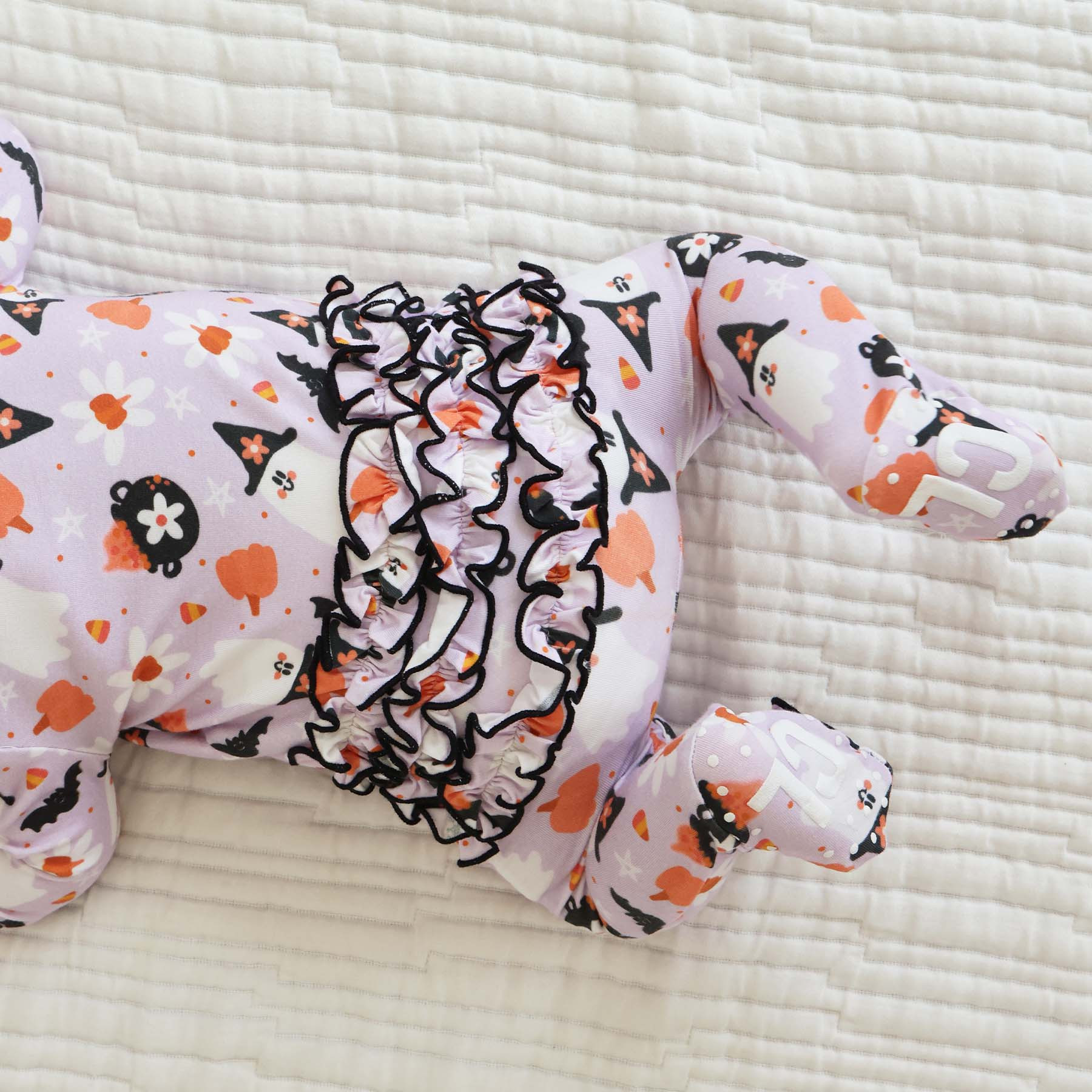 Let's Go Ghouls Ruffle Zipper Footie* | Caden Lane