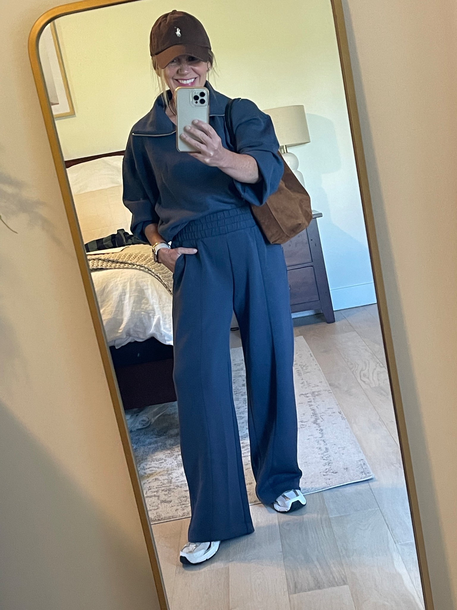 This Old Navy Bounce Fleece Set is SO GOOD and right now just over $50 total 🤯 !! Runs a little roomy through hip/thigh but drapes very nicely, and length is great in petite sizing! I’ve not washed or worn out yet but it feels fantastic - definitely a keeper for me!. Highly recommend.
#petite #ltkover50 

Wearing - XSpetite in bottoms, S in pullover (would have preferred XS or petite sizing but it works!)
**For ref, I wear xxs in Varley**
Hat - polo
Bag - Madewell

#LTKPetite #LTKFindsUnder50 #LTKSaleAlert