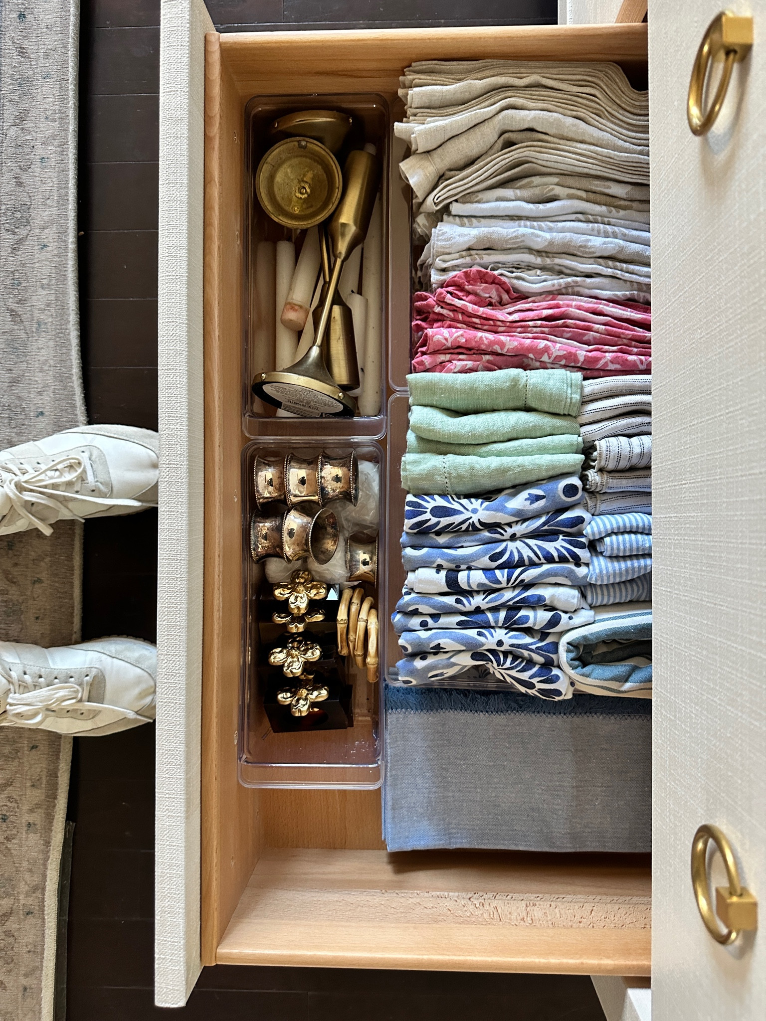 This is how I keep my linens organized and at the ready for the holidays ✨ clear bins perfectly hold my napkins, napkin rings, taper candles, and candlesticks! 

#LTKHoliday #LTKhome