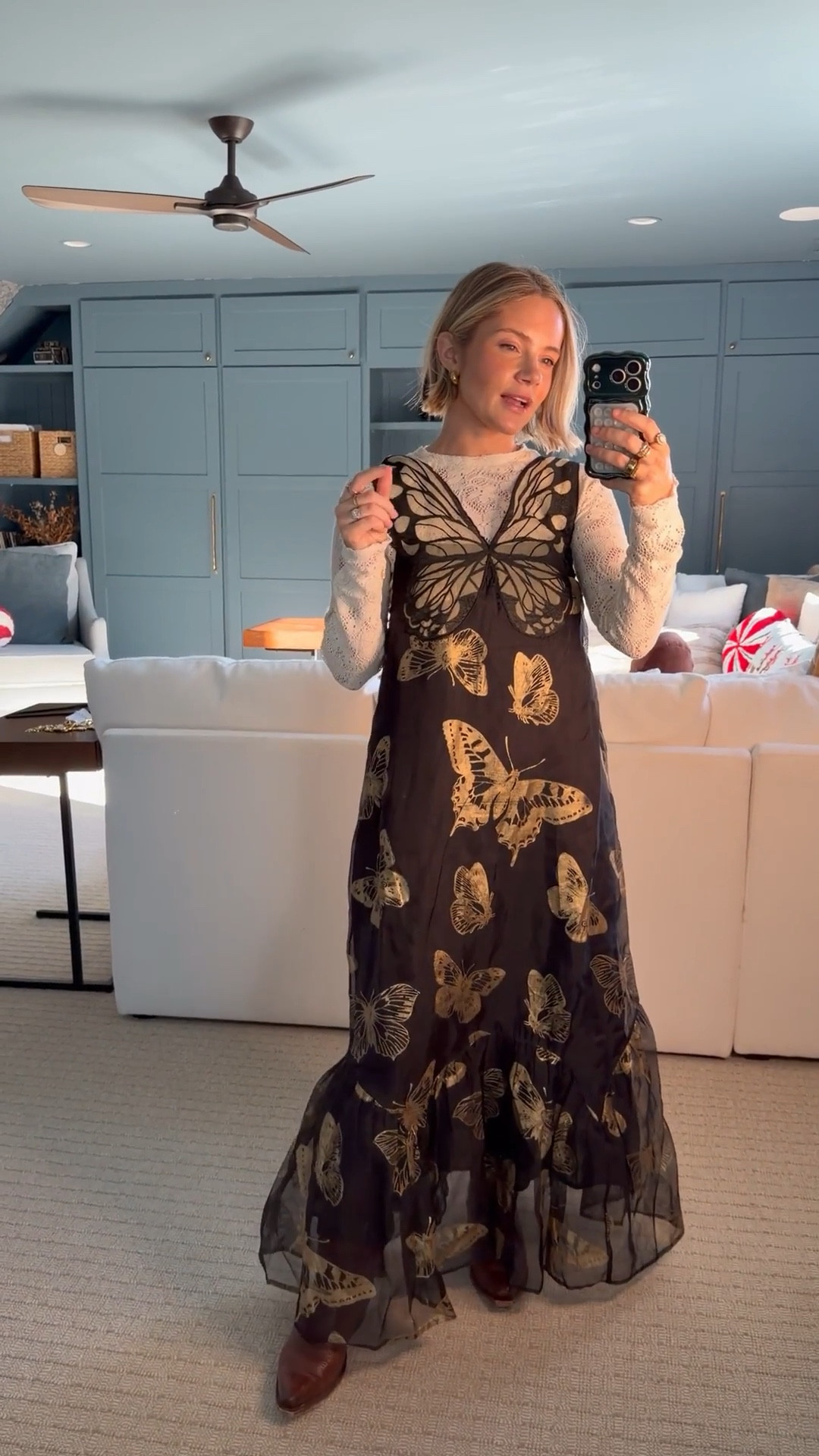 Love this statement dress for winter outfits! How fun is the butterfly? @anthropologie #anthropartner 

#LTKootd