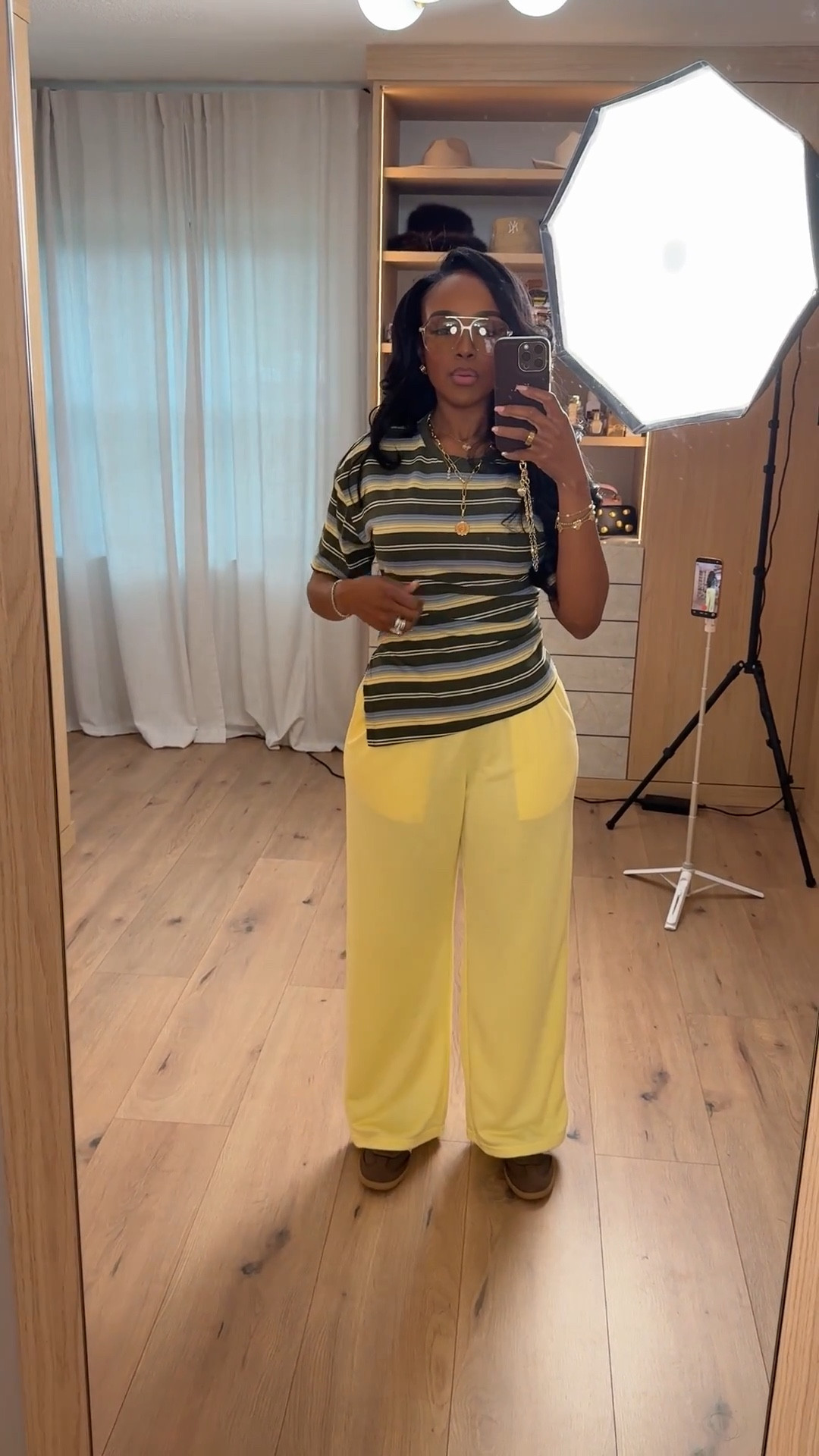 Color therapy but make it effortless 💛💚  

This striped tee + lemon wide-leg combo is giving elevated casual with personality. The relaxed silhouette keeps it comfortable, but the bold color pairing makes it feel intentional. Easy to style, easy to repeat — and when you mix these pieces with neutrals, the cost per wear drops fast.

Bright pants are the statement. The tee keeps it grounded.

Perfect for:
• Weekend errands  
• Casual brunch  
• Travel days  
• Spring & summer everyday looks  

📏 Sizing:  
Top: Size Small  
Pants: Size Small (wide-leg fit)  
Shoes: True to size  

📐 Measurements:  
5’4” · 138 lbs · 34D bust · 27” waist · 40” hips  

Favorite this if you love a bold pop of color in your everyday outfits.

Striped tee outfit, lemon yellow pants, wide leg trouser styling, casual chic spring outfit, colorful everyday look, relaxed elevated basics.

Follow me on Instagram and YouTube @kirasfashionfinds