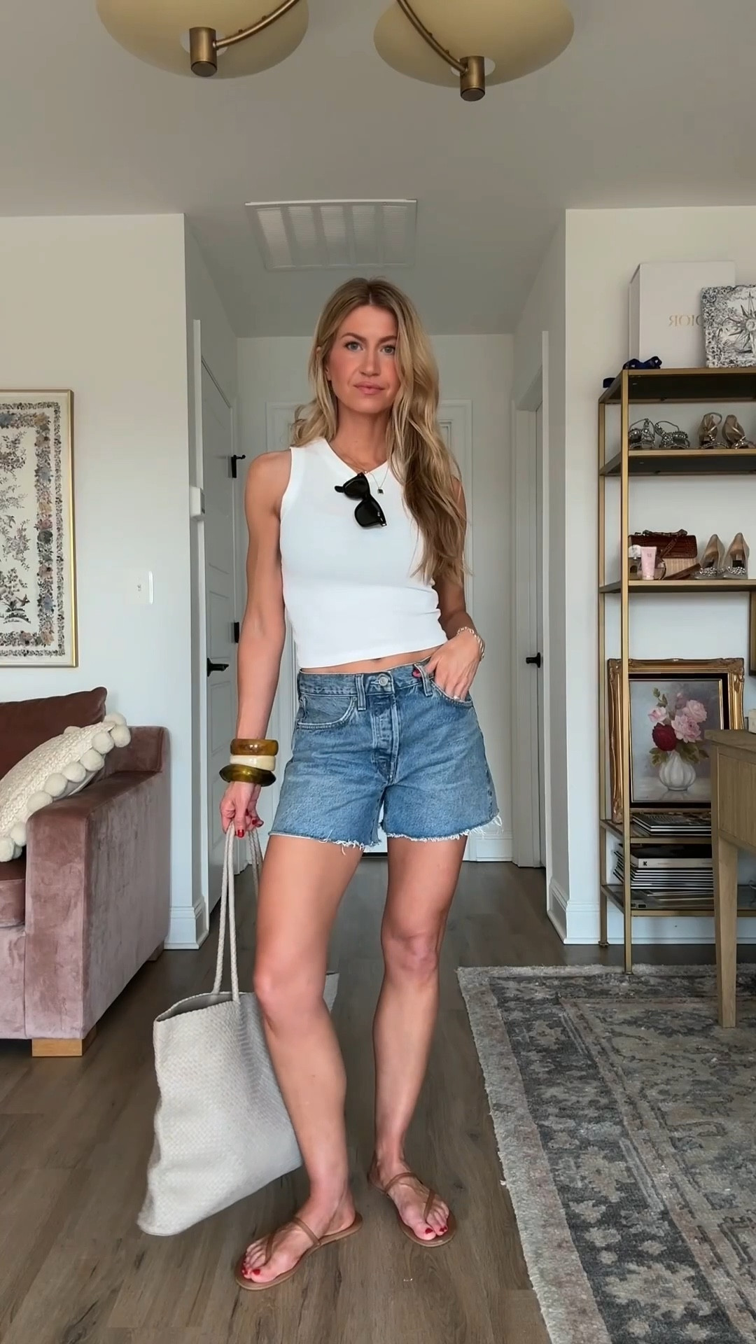 My favorite denim shorts finally restocked! 
They run TTS, but I rec sizing up for a slightly oversized fit. Wearing a 26. Wash is ‘Fairway’ 

White tank: only $15! TTS, wearing a S

Sandals: run small, order a full size up

Leather tote color: taupe 

#LTKSwim #LTKspring