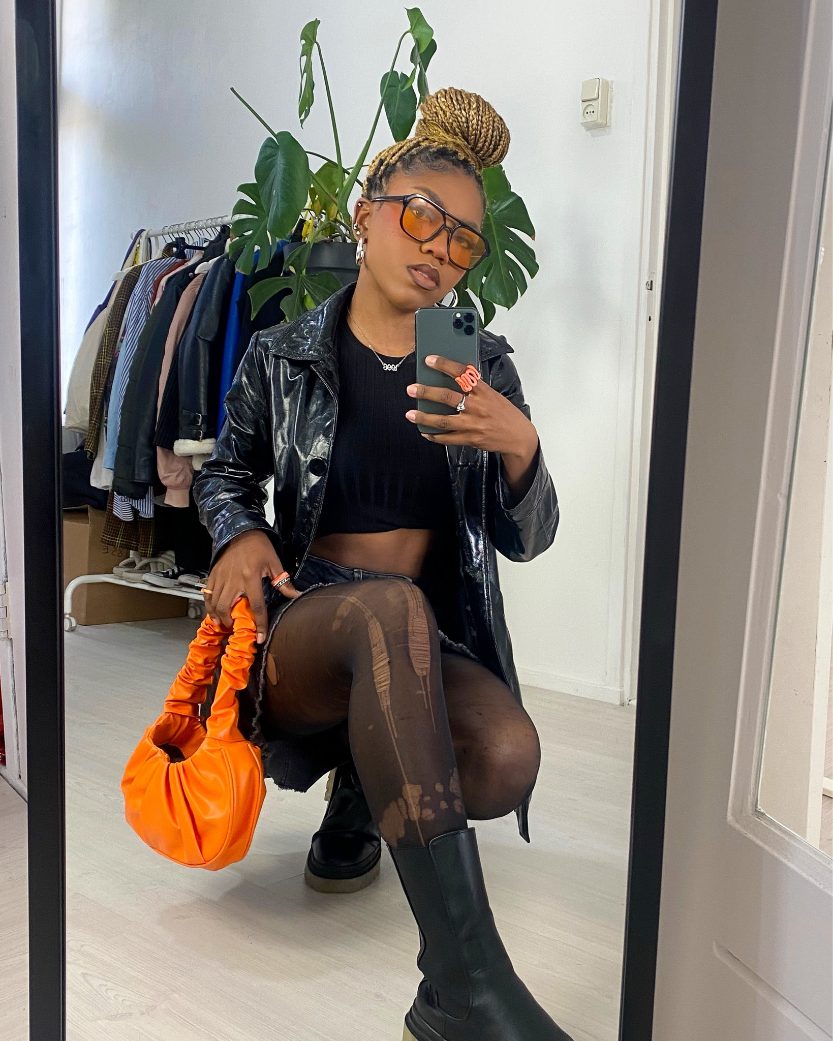 How to add a pop of color to your fall outfit🧶. Go for colored accessories, such as a colored bag, like this orange SHEIN ruched shoulder bag, or colored sunglasses. 

An all black fall outfit combined with orange accessories. Edgy fall outfit idea. 
H&M Nederland black cropped tank top, grey denim skirt, fall black tights, orange bag, orange sunglasses, and black Primark boots. 

#LTKSeasonal #LTKeurope #LTKstyletip