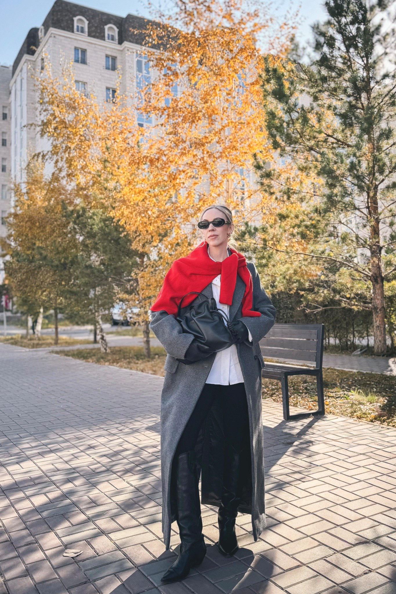 Gray and red outfit, gray wool coat, bright red sweater, Spanx leggings, black western boots, black leather gloves, classic style, Loewe Flamenco clutch

#LTKItBag #LTKShoeCrush #LTKOver40