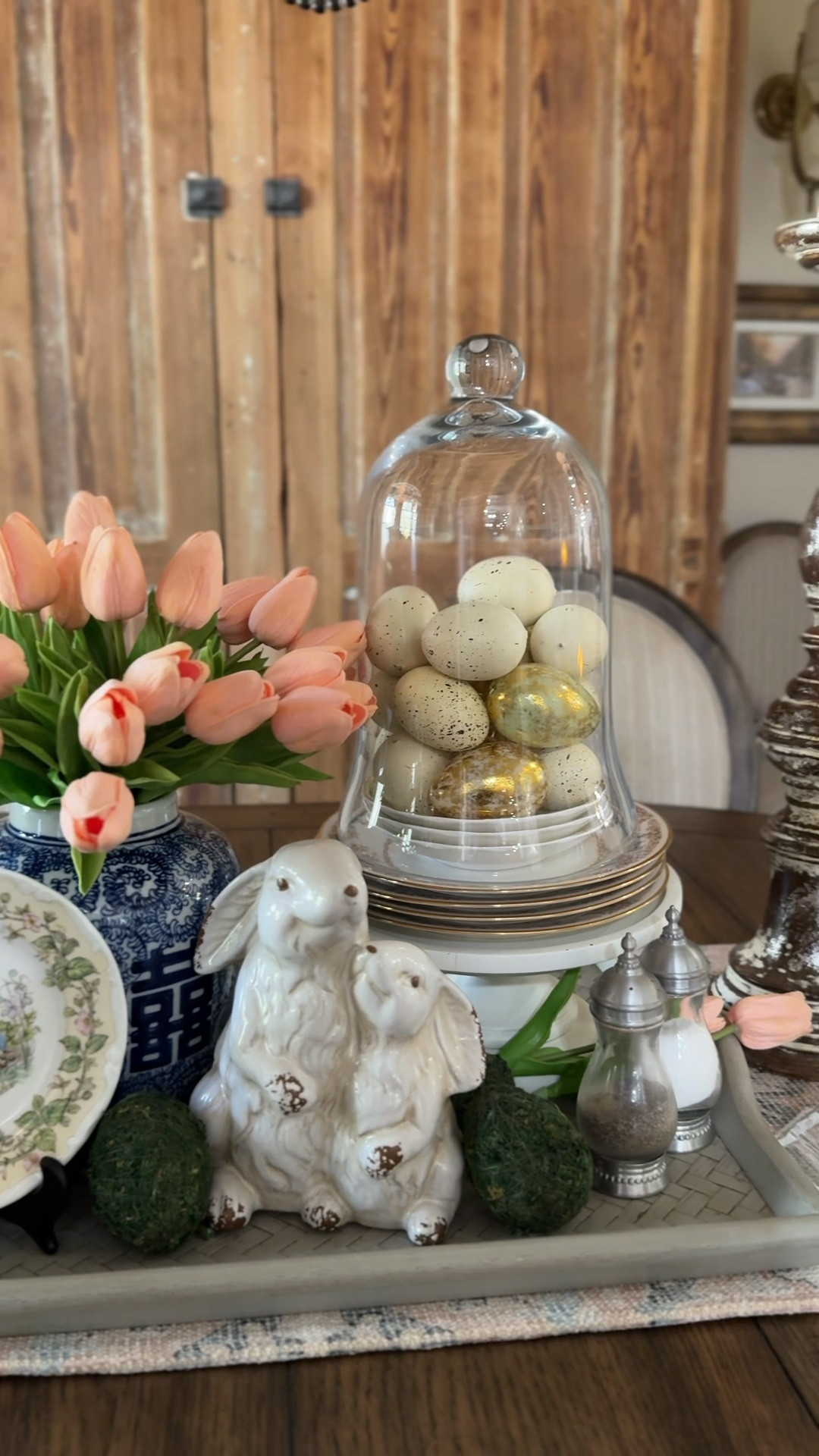 Chinoiserie chic spring tablescapes featuring faux eggs and bunnies. 

Chinoiserie | battery operated candles | rabbit statues | faux eggs | tulips
