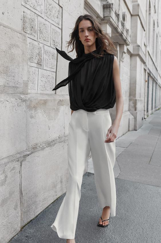 High-waisted pants with front pleats. Front pockets and false flap pockets on the back. Wide leg.... | Zara US
