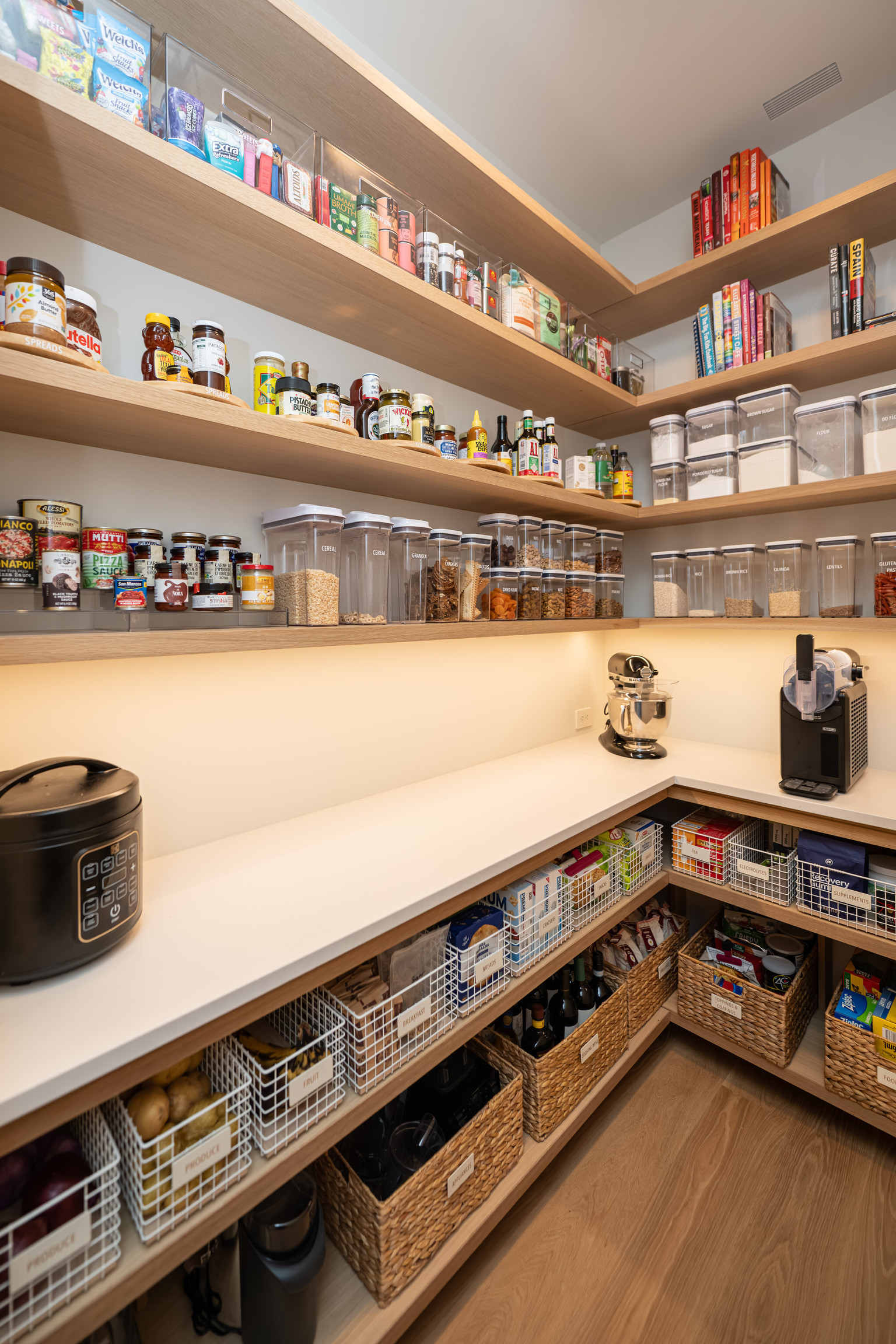 Welcome to the Grand Garcia kitchen and pantry — a set of spaces thoughtfully designed to support both everyday family life and the rhythm of a working chef.

Unlike a traditional kitchen layout, this home features three interconnected spaces: the main kitchen, a dedicated chef’s kitchen, and a pantry designed to support both. From the beginning, the priority in these areas was clear: functionality first.

Because these spaces are used daily by the Garcia family and their personal chef, our team worked closely alongside him throughout the organizing process. His insight into daily routines, tools, and workflow helped guide how categories were created, where items were placed, and how the spaces would ultimately function behind the scenes.

In the chef’s kitchen especially, the inventory of small appliances, tools, and specialty items required a highly intentional approach. Micro-categorization, clear labeling, and thoughtful placement ensure that everything has a logical home, making it easy for anyone working in the space to find what they need quickly.

Another meaningful aspect of this project was the ability to repurpose many products from the Garcia’s previous home, thoughtfully integrating them into these new spaces while maintaining both beauty and efficiency.

These spaces are a beautiful example of what happens when design, organization, and real-life routines work together.

✨

#kitchenorganization #pantryorganization #sergiogarcia #luxuryhomes #austintxhomes


#LTKHome