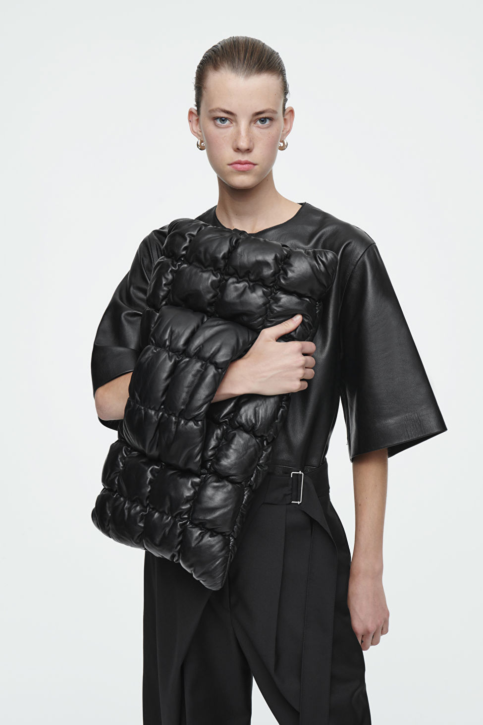 PILLOW OVERSIZED QUILTED CLUTCH - LEATHER - BLACK - Bags - COS | COS (US)