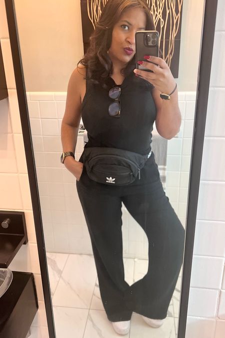 My “Give Me All You Got” Monday OOTD 🤗 no space for a work tote, all hands on deck because Monday be Monday-ing😉 these are elastic waist casual black slacks, the most comfy white wedge sneakers (just walked for days in London & Paris with them), keeping it monochromatic with a classic black tank and my waist pack catch-all. I also keep the a denim button-down in my car in case I get cold🤗

#LTKfit #LTKunder100 #LTKstyletip