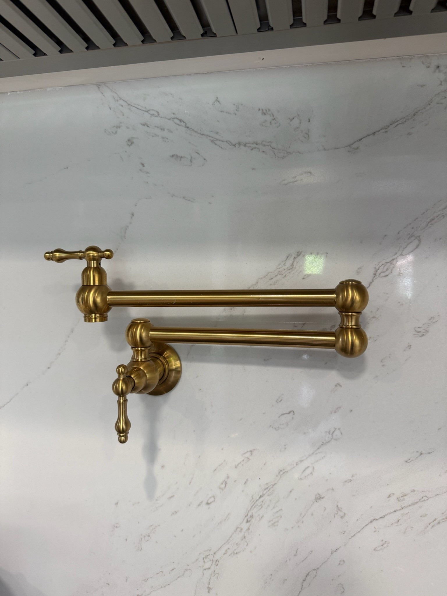One of my favorite kitchen touches! This brass pot filler makes the prettiest statement against the marble backsplash ✨

#LTKfindsunder100 #LTKsalealert #LTKhome