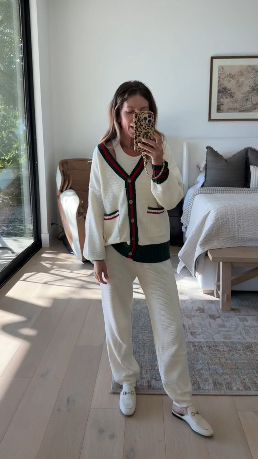 Excited to share my cozy Amazon travel outfit from yesterday! The girls say I look like Christmas🤣 This designer-inspired set in size small is perfect for travel or lounging! The full-length tank underneath has a built-in shelf bra with padding, so no need for an extra bra! It’s seriously the best! ❤️ #AmazonFashion #TravelInStyle #ComfyAndChic

#LTKStyleTip #LTKFindsUnder50 #LTKTravel