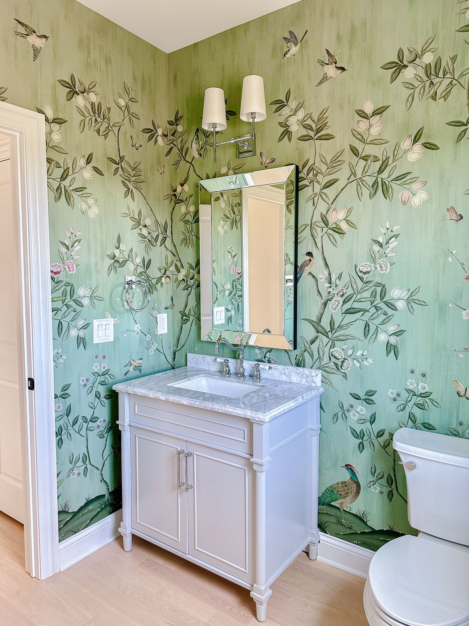 A glimpse into one of our guest bathrooms! The chinoiserie wallpaper from Rebel Walls has completely transformed the space! 🌿🕊️🌸

#LTKhome