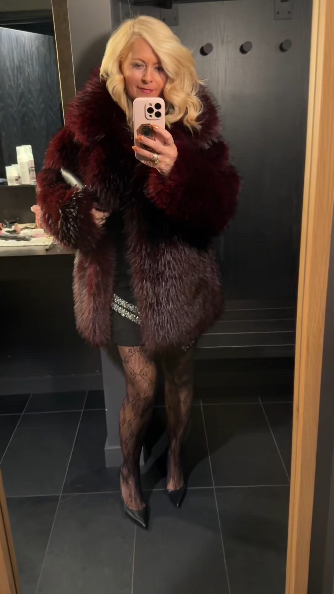 Outfit of the night. 
Burgundy faux fur jacket XS
Gem mini skirt Size 0
Silk halter top XS
Black pattern tights
Heels
Statement jewelry 

#LTKPetite #LTKootd #LTKOver40