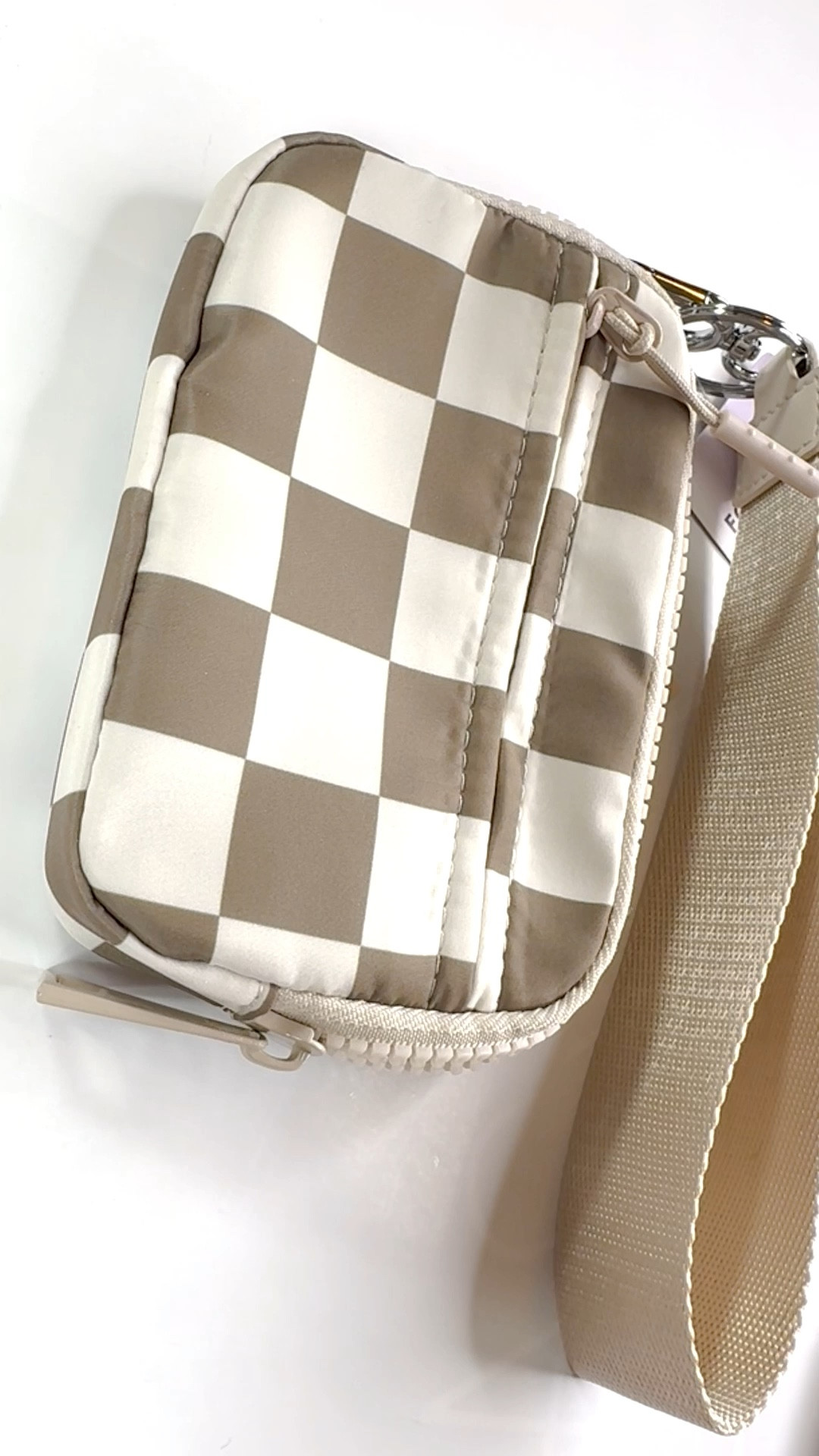 This checkered wristlet? Eating. Soft, sturdy, and blocking scammers with RFID protection like ✨nope✨.

#LTKGiftGuide #LTKFindsUnder50 #LTKU