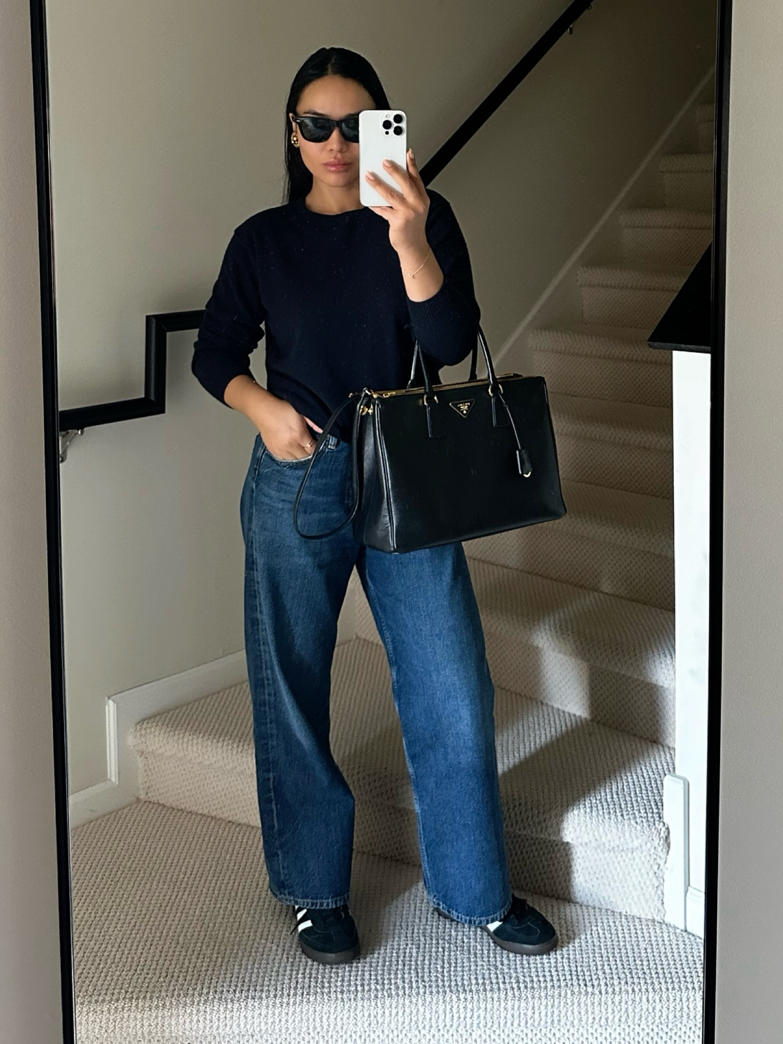 Navy knit, denim, sambas, prada bag 