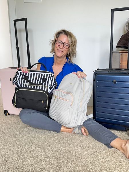 The best travel bags: carry-on luggage and backpacks and 2 crossbody bags. These wheels on my carry-on bags are rugged quality for cobblestone roads in Europe! My sweater tee is tts with the prettiest sleeves and fit. #carryonluggage #backpack #amazonfinds #travelessentials 

#LTKtravel #LTKeurope