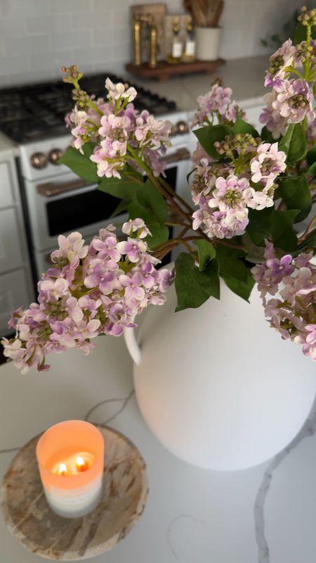 How beautiful is this faux spring arrangement?! We have 2 giant lilac bushes that bloom and smell soooo good every year but they never last long enough!! I’m obsessed with how real these look 😍

#LTKSeasonal #LTKhome #LTKVideo