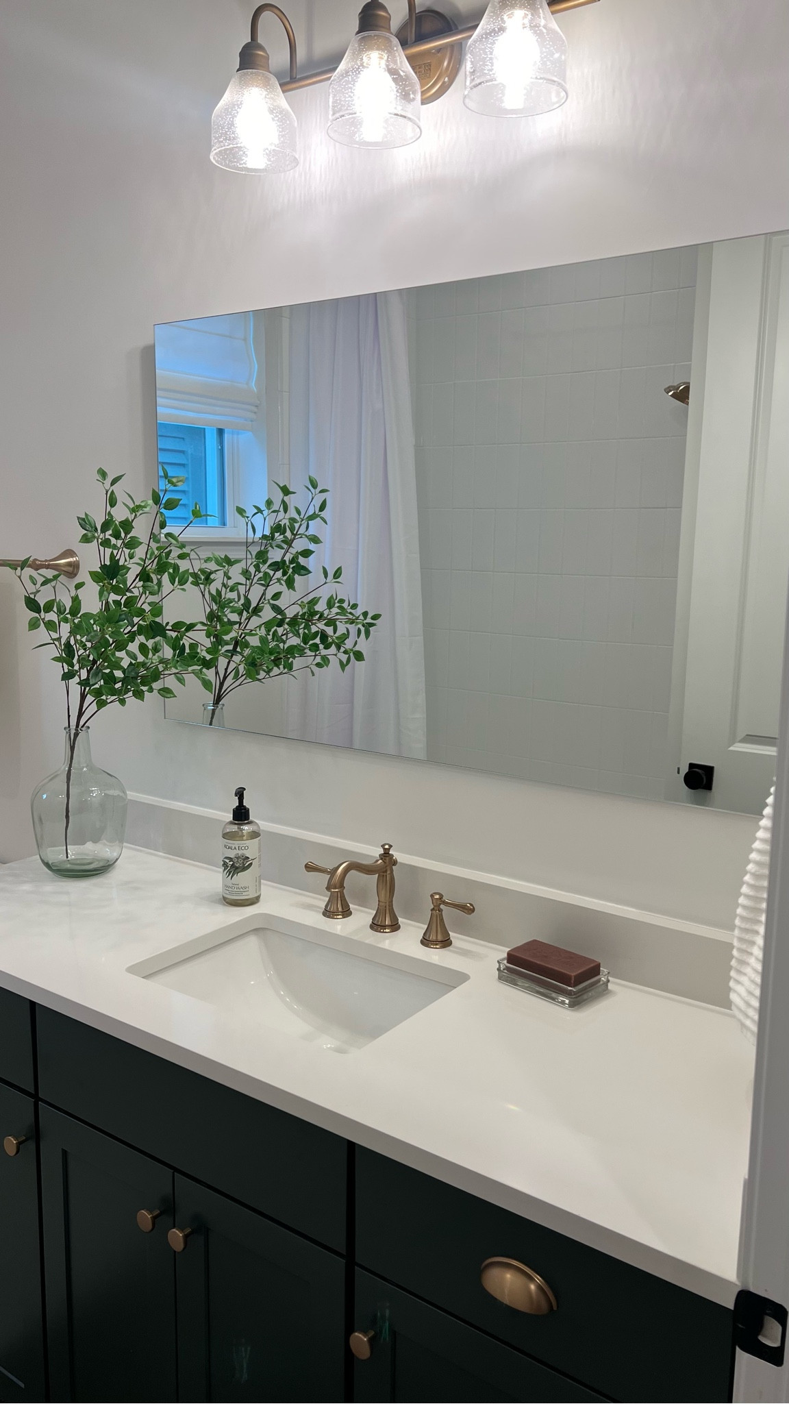 Hall bathroom progress 🤍 Love this huge Amazon frameless mirror for under $200! 

#interiordesign #homedecor #modernorganic #greenvanity #homedesign #homedecor 

#LTKSaleAlert #LTKHome