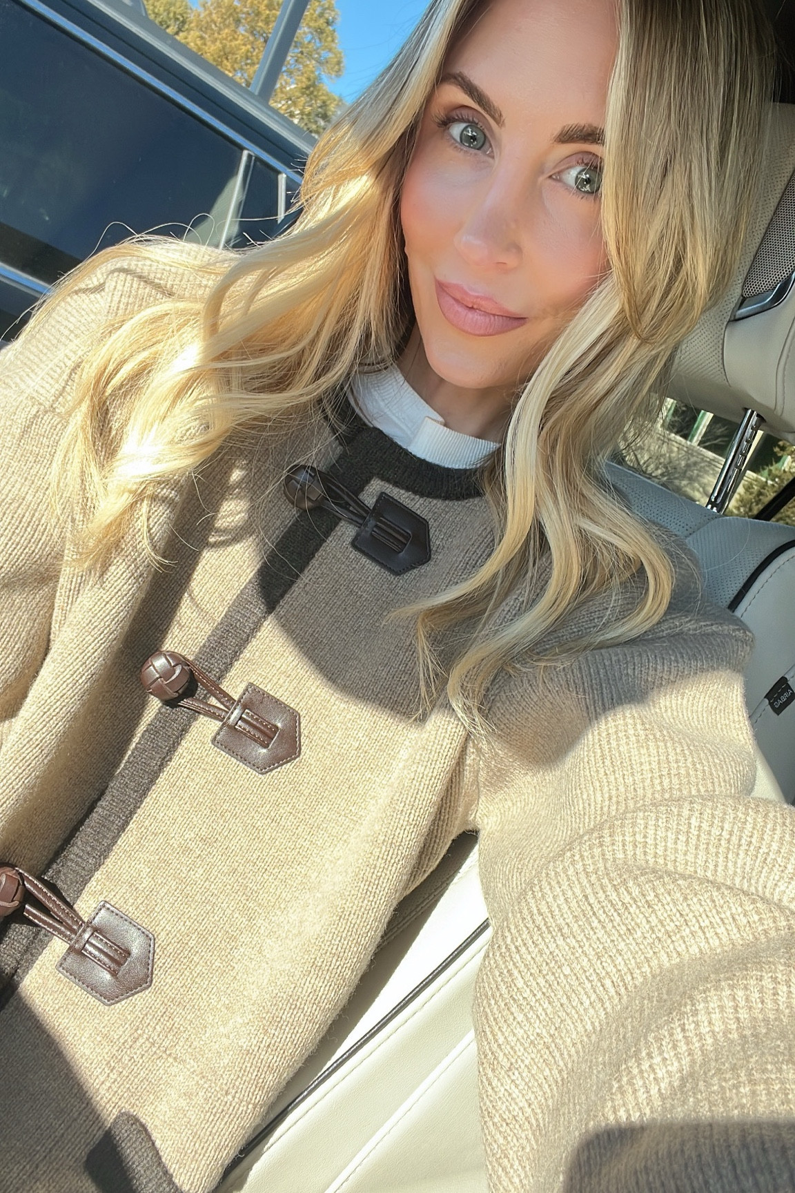 Love this leather detail beige and brown sweater 

#LTKStyleTip
