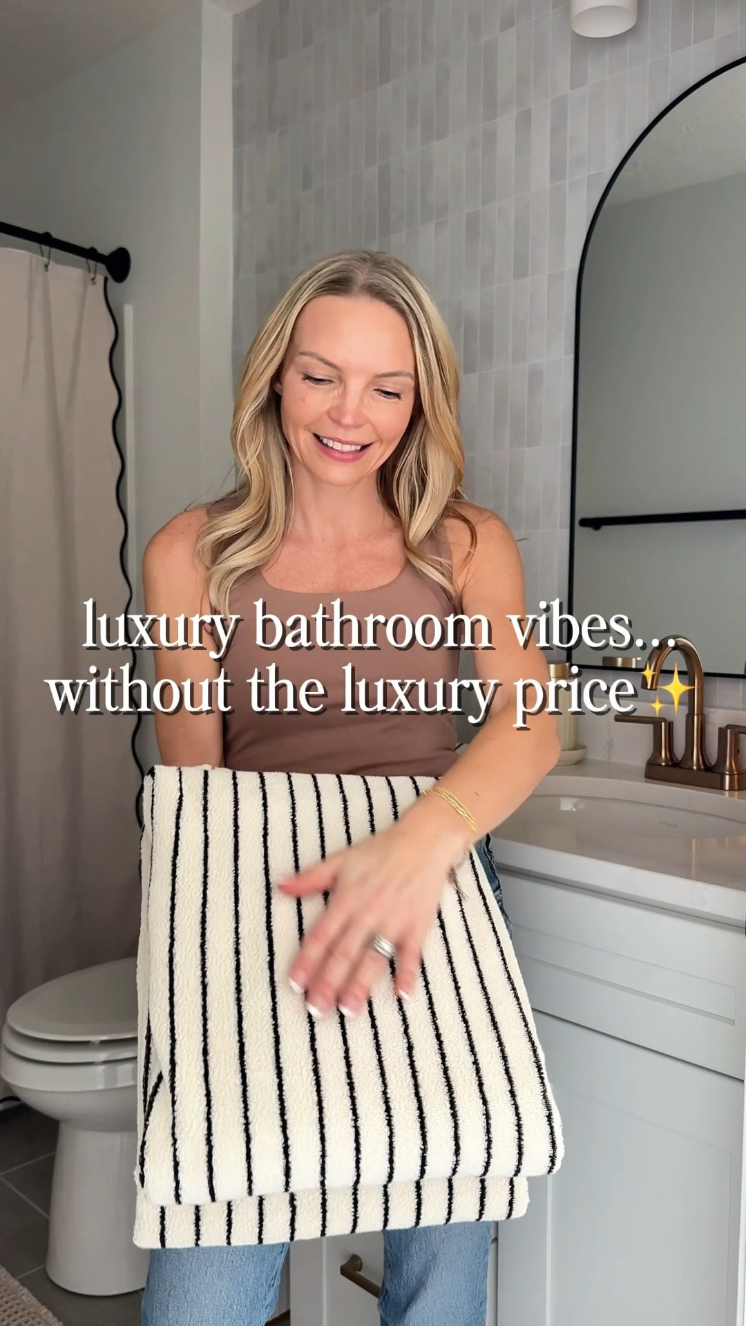 This budget-friendly bathroom makeover completely changed the space ✨ It looks high-end without the high-end cost, and even the peel & stick tile was affordable and super easy to install.

#LTKHome #LTKdayinmylife