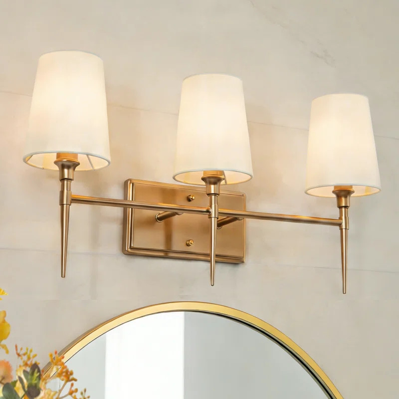 Lidia 3 - Light Dimmable Amber Gold Vanity Light with Off-White Shades | Wayfair North America