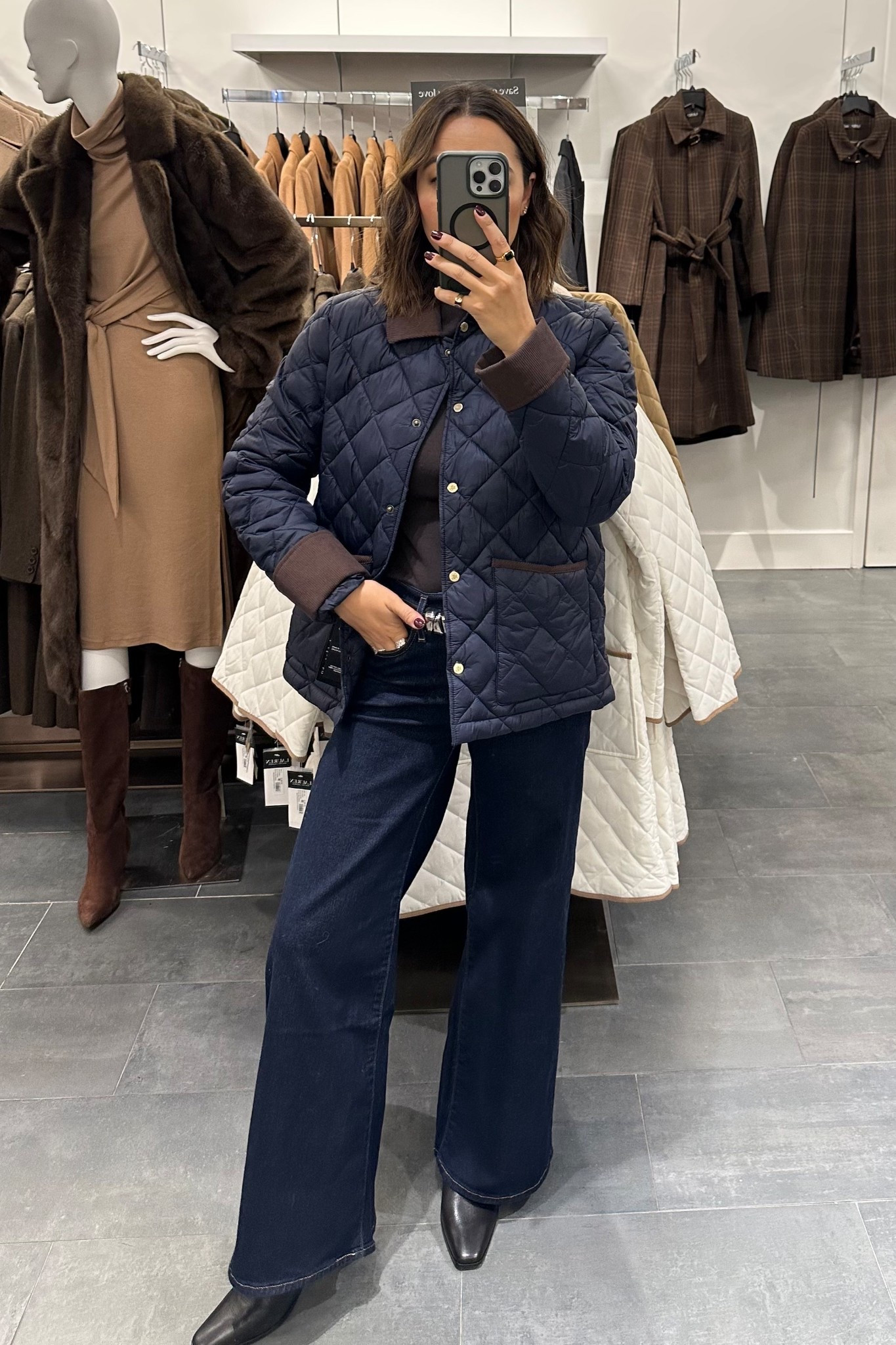 Lauren Ralph Lauren quilted coat on major sale 

Barn jacket — linked to similar ones 
Levi’s wide leg jeans 
Steve Madden dusty boots 

#LTKootd