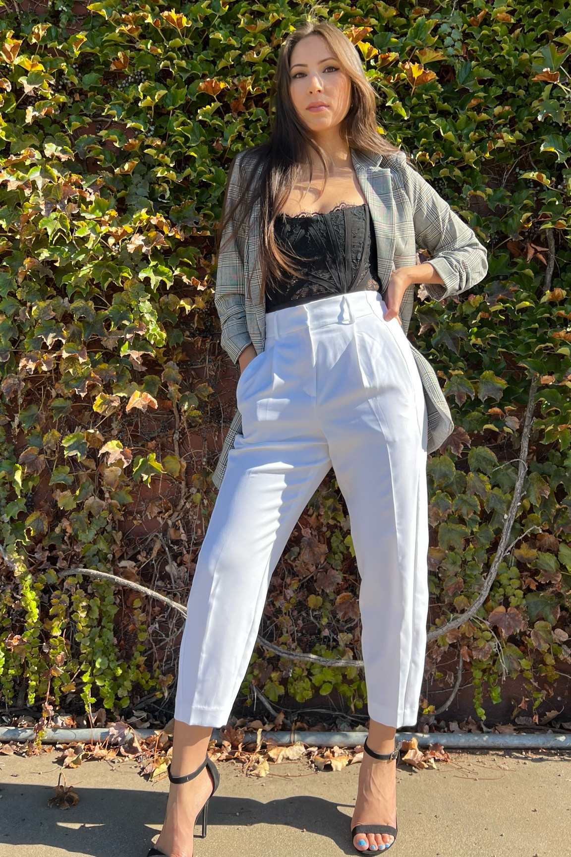 Power stance in power pants.

White trousers are a closet staple!
This corset from NBD goes with everything.
And, a neutral plaid blazer will never steer you wrong!