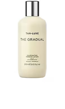 The Gradual Illuminating Gradual Tan Lotion
                    
                    Tan Luxe | Revolve Clothing (Global)