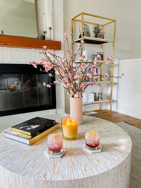 Spring florals and all the different textures coming to play in our living room. The perfect setting for a date night happy hour 💕

#LTKhome #LTKstyletip #LTKSeasonal