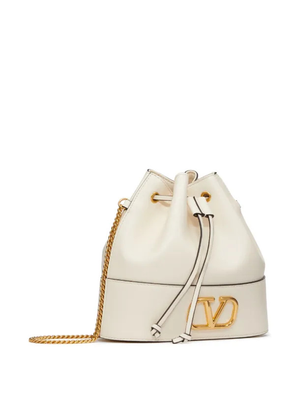 Valentino Garavani VLogo Signature mini bucket bag in nappa leather with chain | Farfetch Global