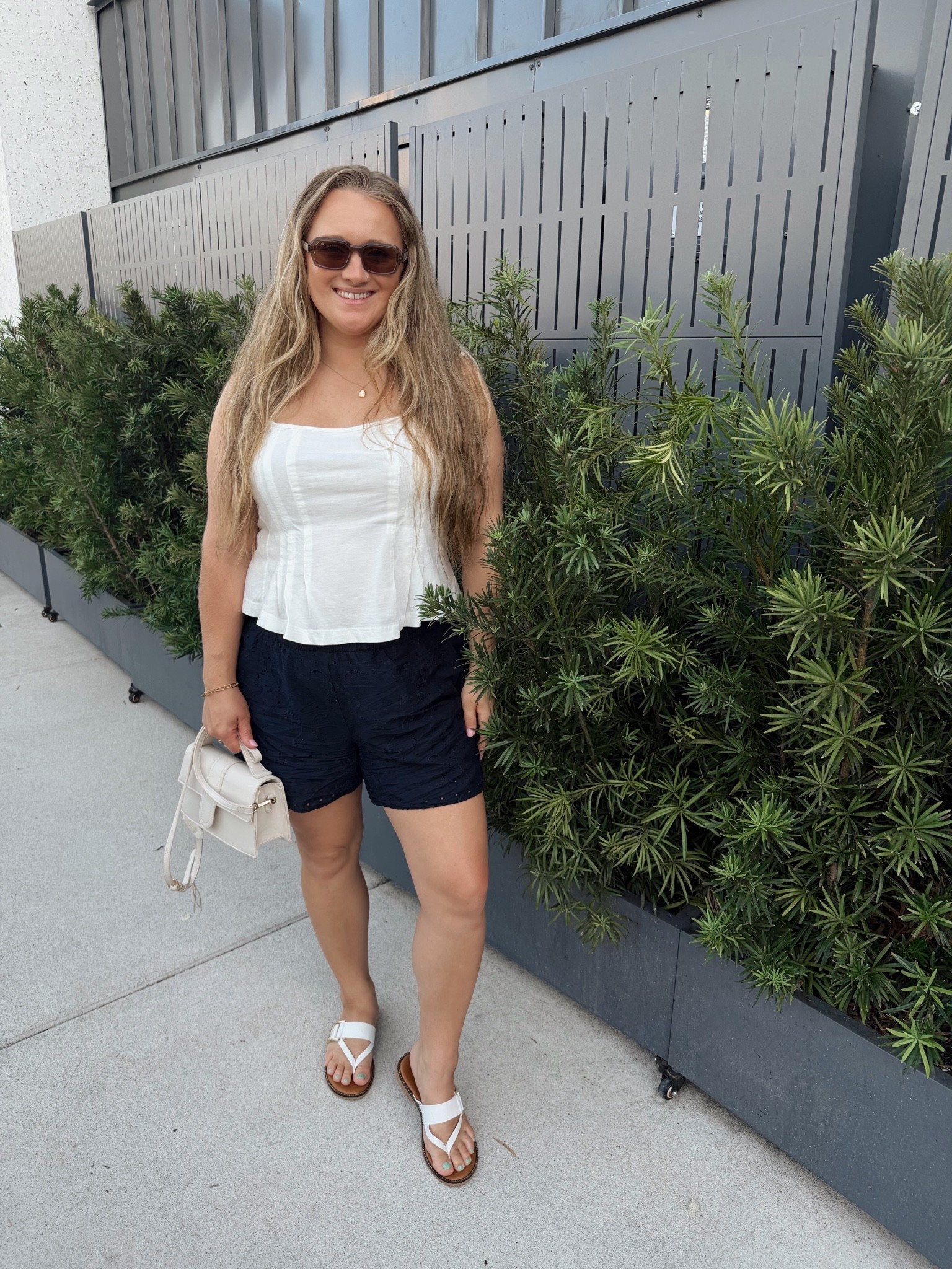 Summertime outfit! White tank + navy eyelet shorts.

#LTKSeasonal #LTKootd